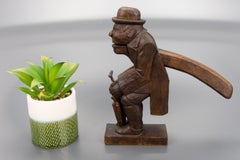 Hand Carved Dark Brown Wooden Figural Nutcracker of a Man, Germany, 1930s