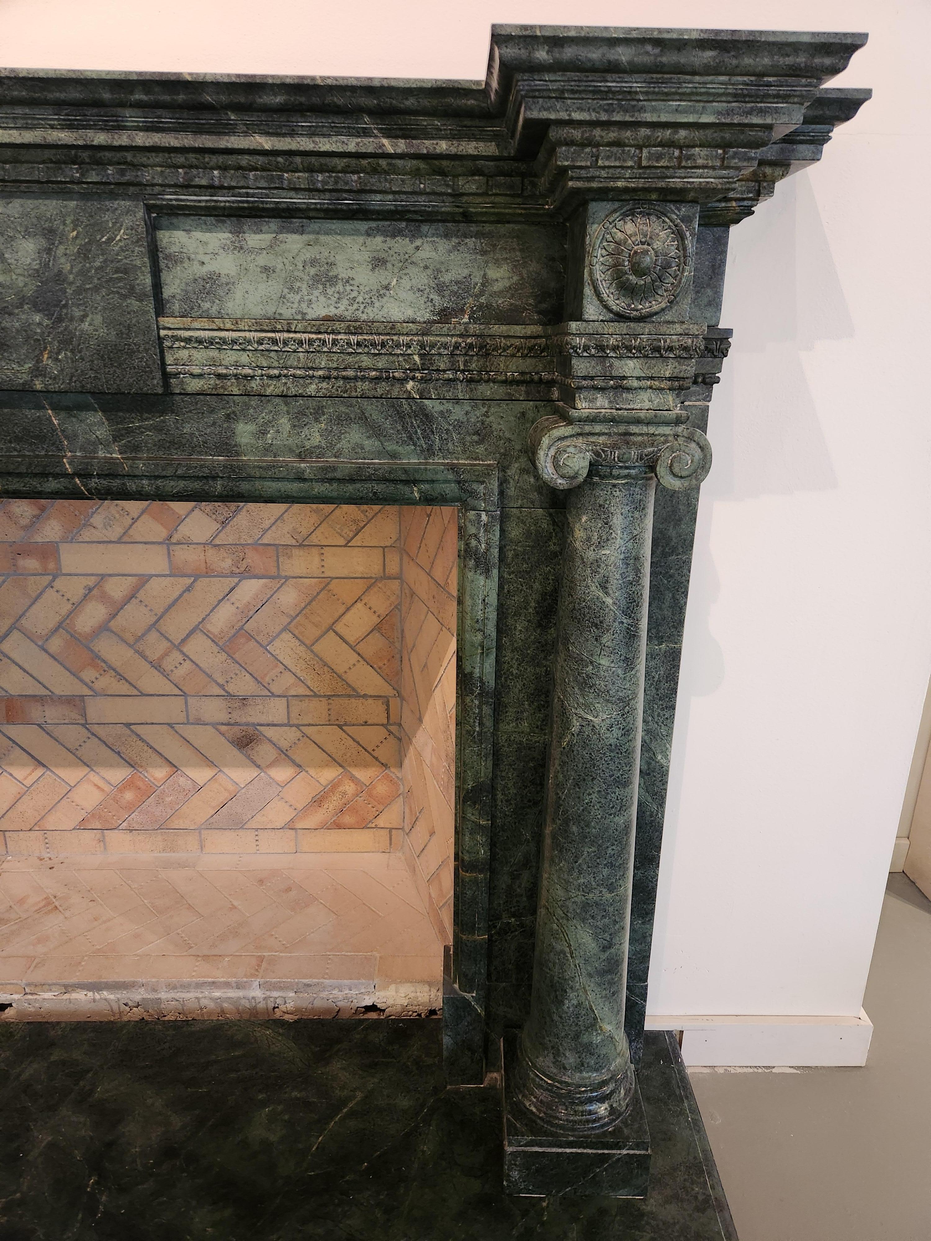 dark green fireplace mantel