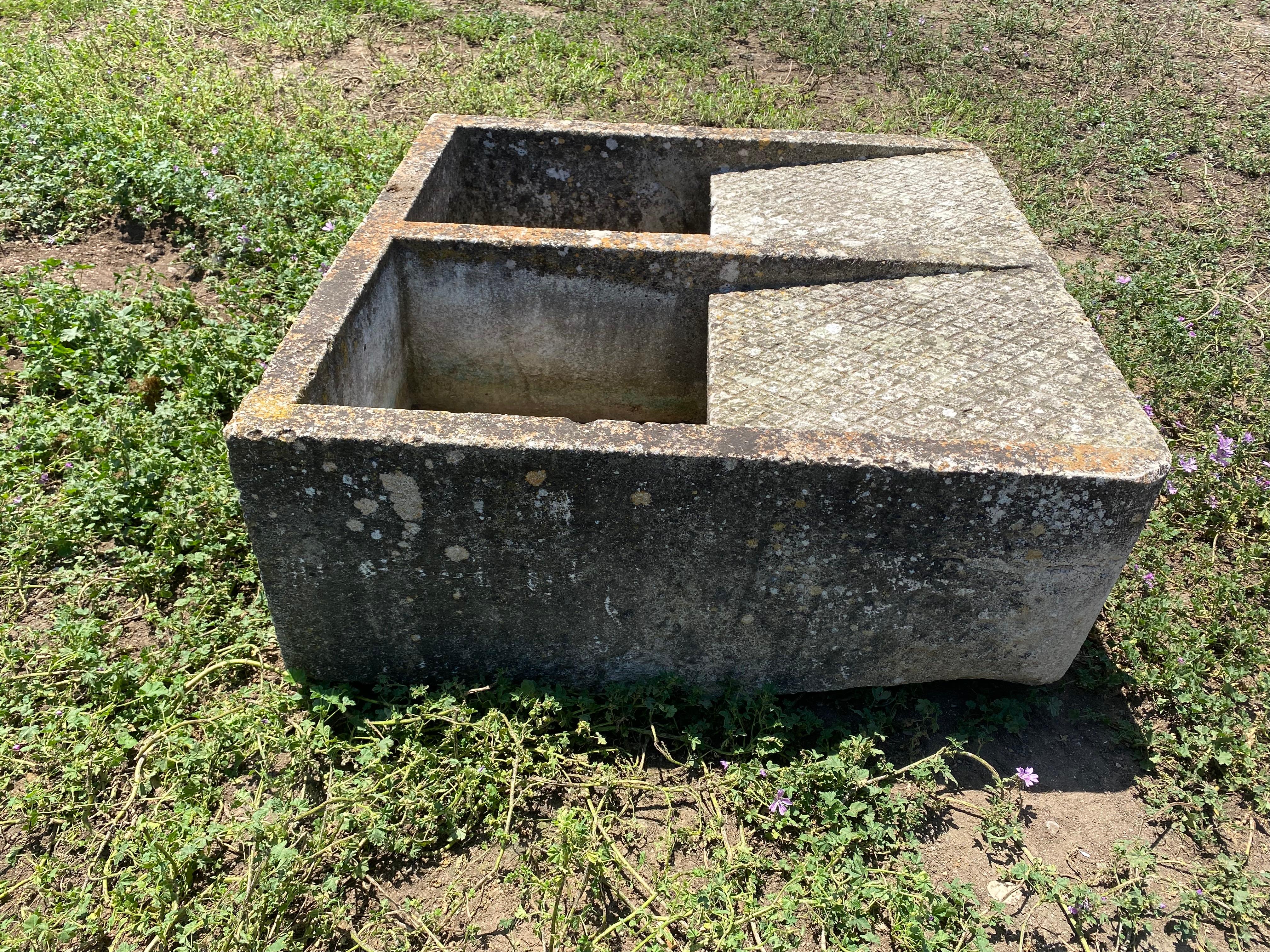 century

 Pretty  limestone wash basin from the south of Spain /Andalucía , finely worked by hand with its two small niches in the front part which were used for soap and  brushes as well as its surface hand-carved into  quadrangular cubes where
