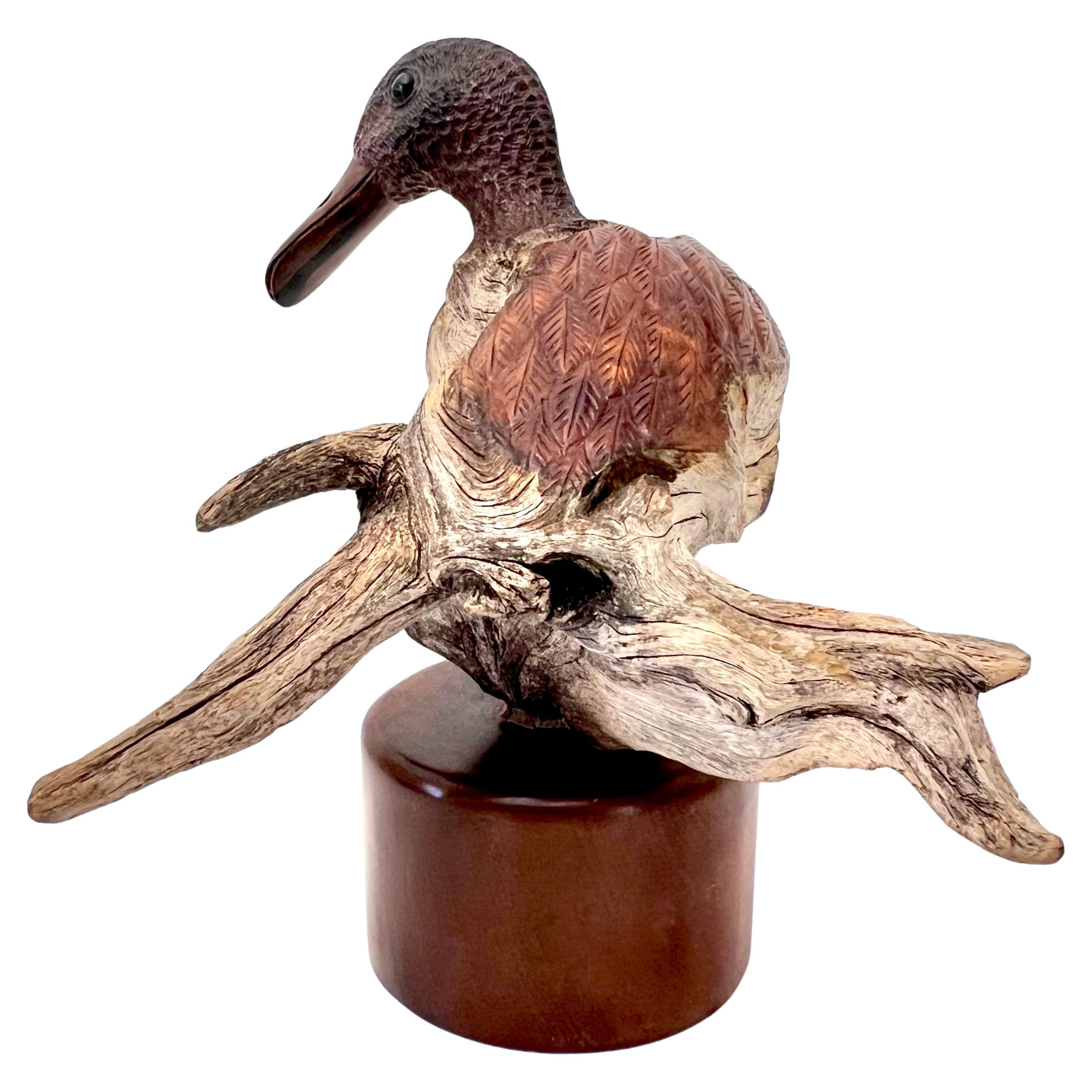 Stunning artisan hand carved duck out of driftwood.  Beautifully crafted with a mix of the raw and the refined.  Photos of this do not do it justice.  For duck lovers this is a masterful and artistic sculpture.
It sits on a beautiful smooth wood