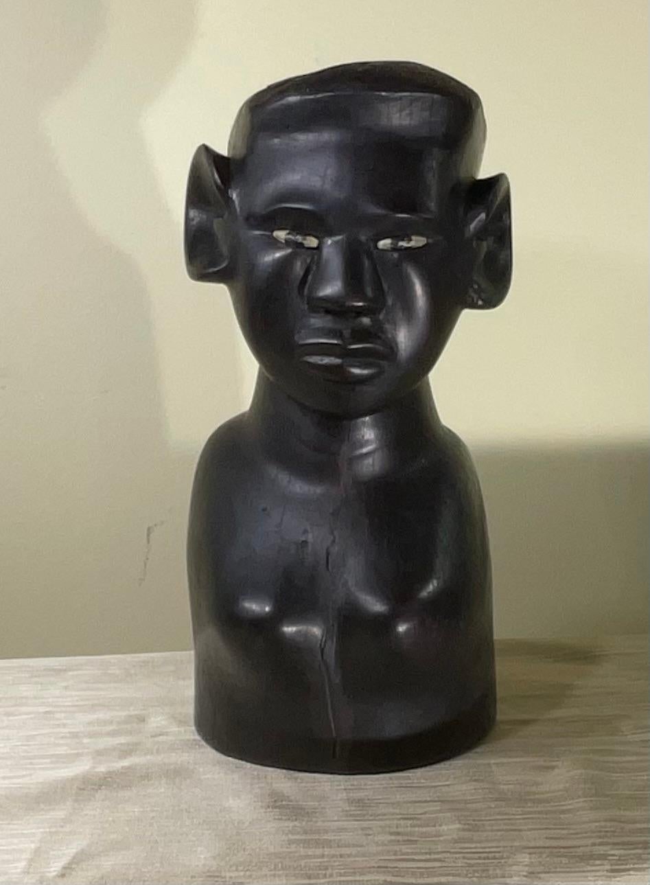 Hand-Carved Ebony Wood Sculpture with Inlaid Eyes In Good Condition For Sale In Delray Beach, FL