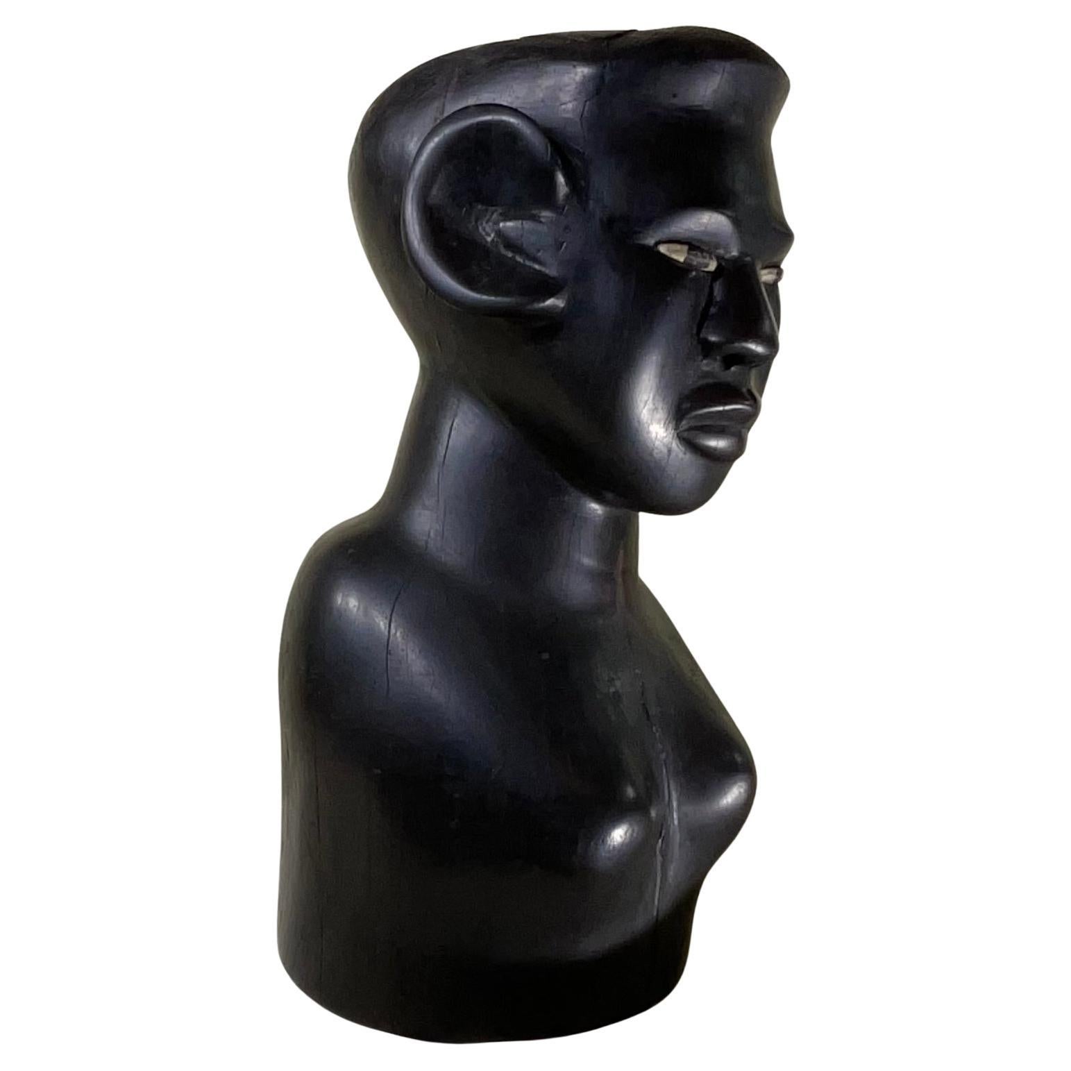 Hand-Carved Ebony Wood Sculpture with Inlaid Eyes For Sale