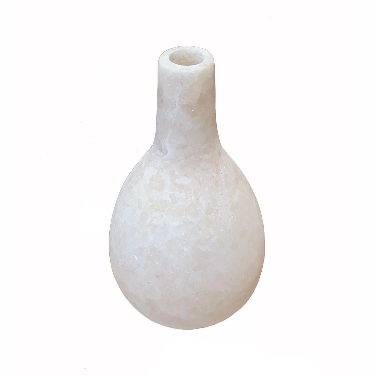 A decorative alabaster bottle, hand-crafted in Luxor, Egypt. A bottom opening allows the piece to be used as a lamp or screen for low-intensity lights (professional conversion recommended). 

 