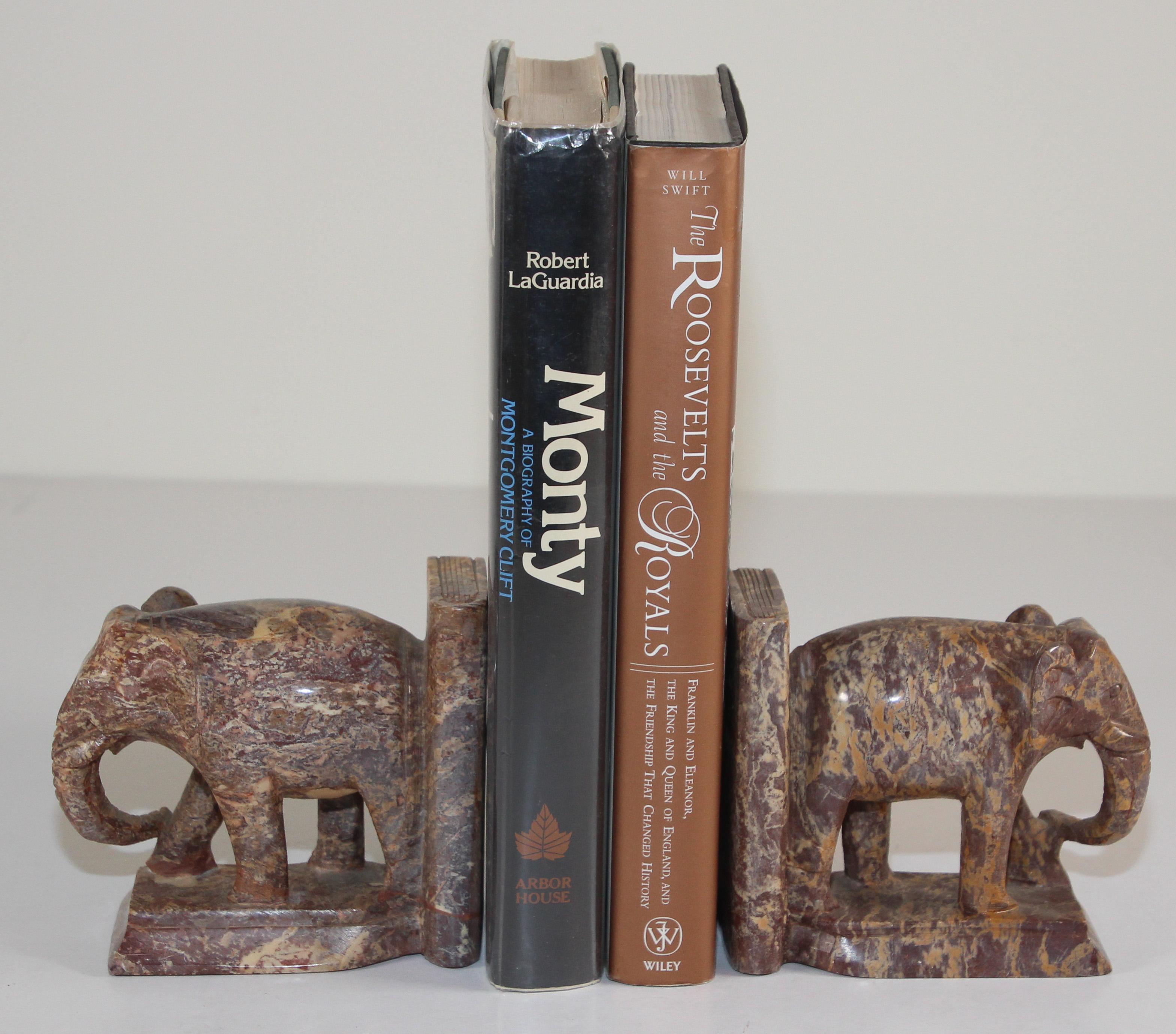 Hand-carved asian elephant marble sculpture bookends, 1950s
Nice vintage pair of hand crafted brown marble elephant bookends.
Vintage bookshelf decor elephants bookends animal sculpture.
These are hand carved and therefore not completely