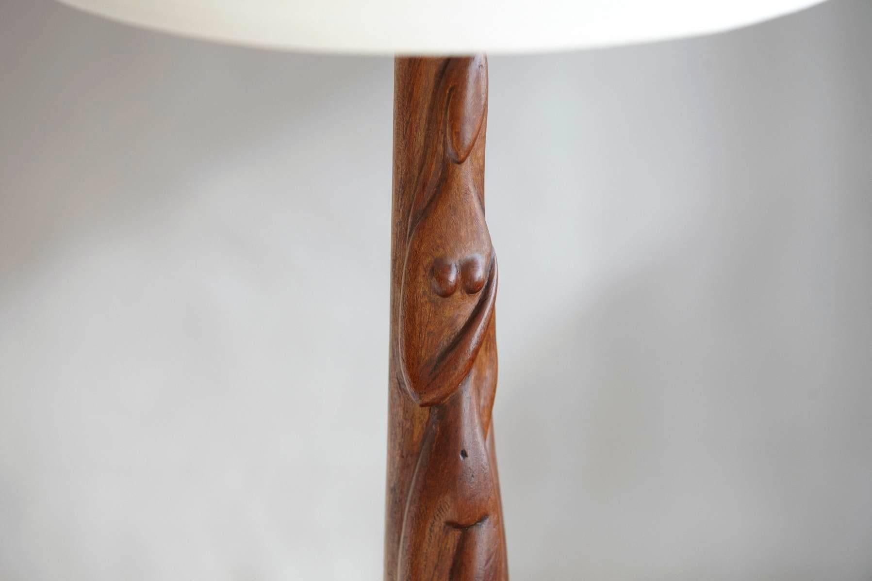 Beautiful hand-carved female nude wood sculpture table lamp with tinted black wood base, by Nicholas (Nimo) Mocharniuk (Russian/American 1917-1993), signed on back NIMO.
The sculptured stem is in excellent condition, very nice patina to the