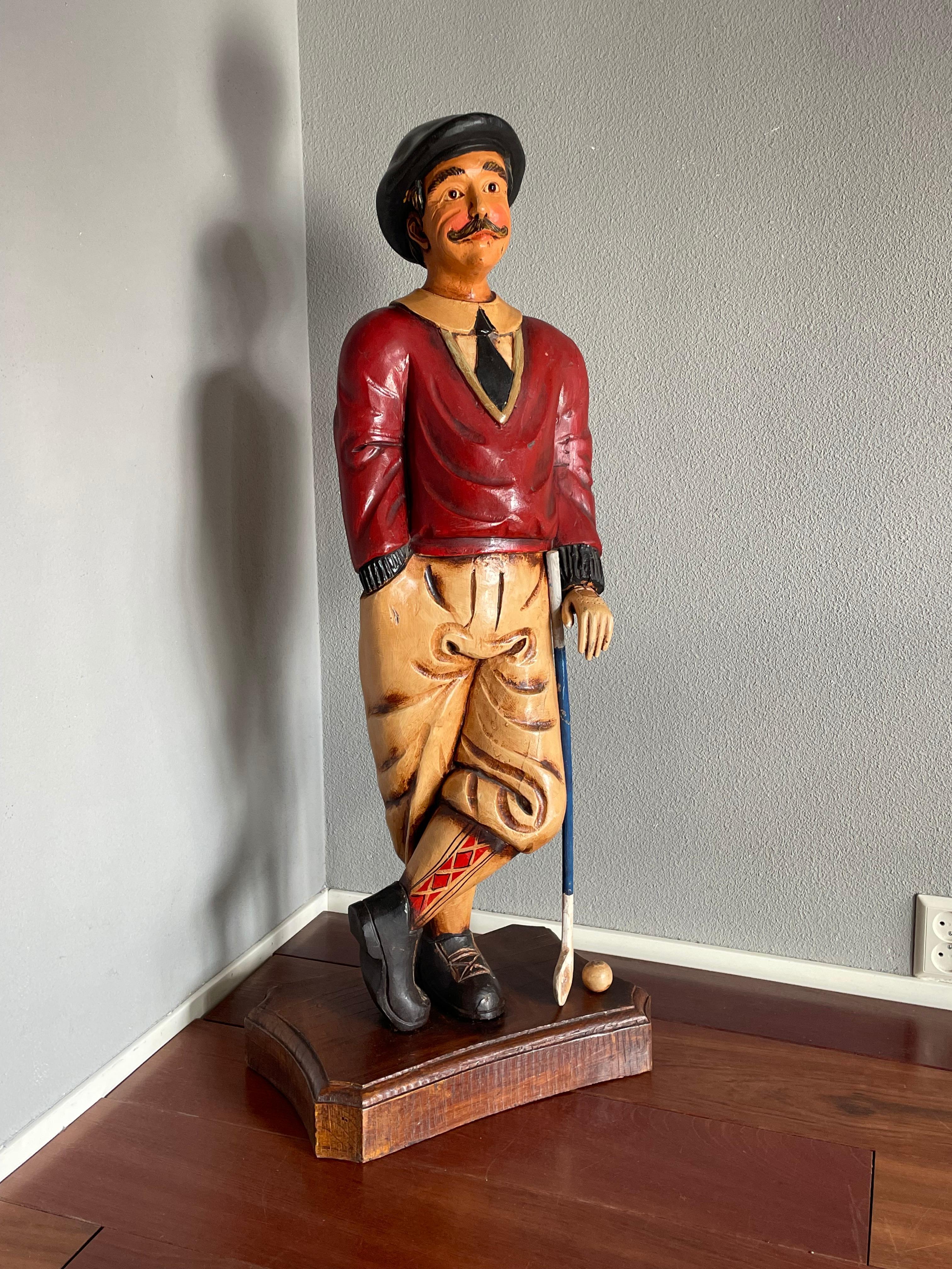 Large and rare, solid wooden vintage golfer sculpture with glass eyes.

This golfer in his early to mid 20th century golf outfit is ready to take on the Augusta National and he is an absolute joy to own and look at. The natural and cery relaxed