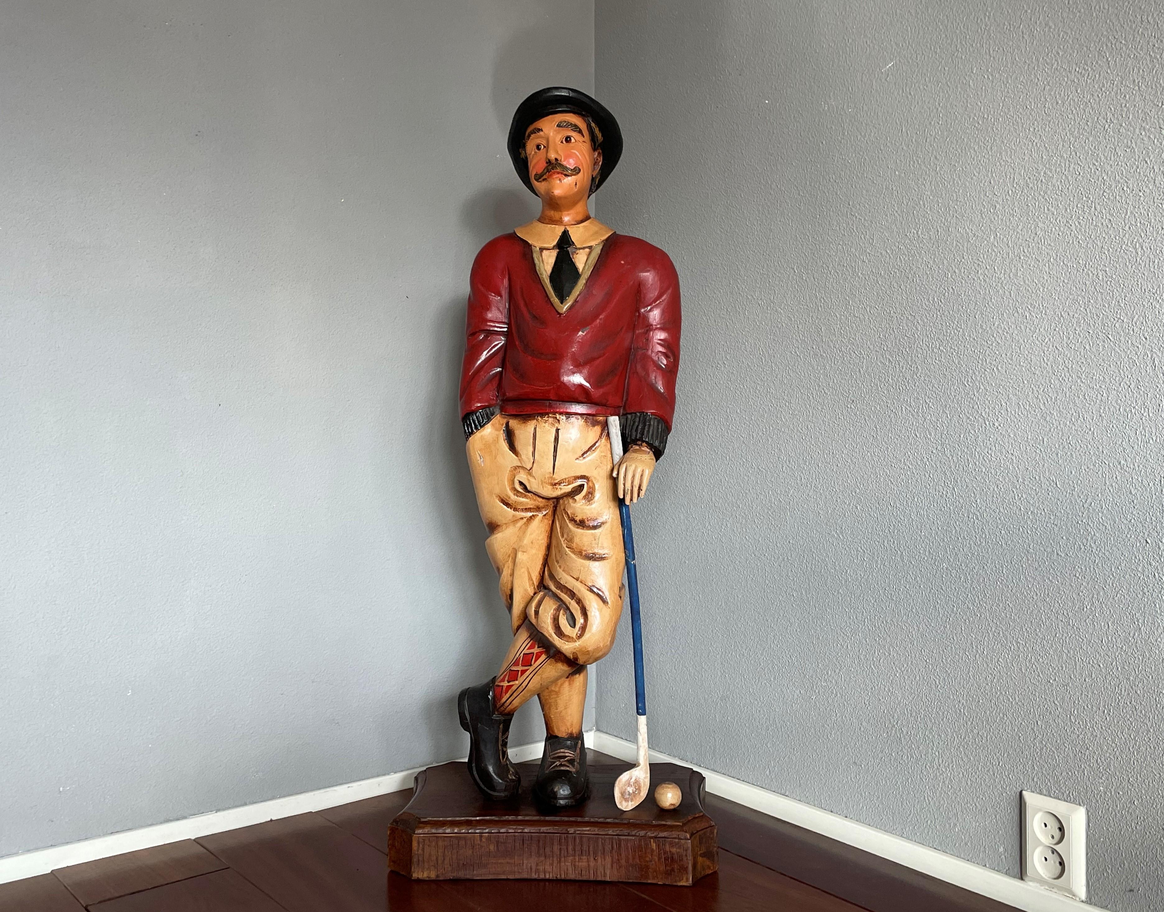 wooden golfer statue
