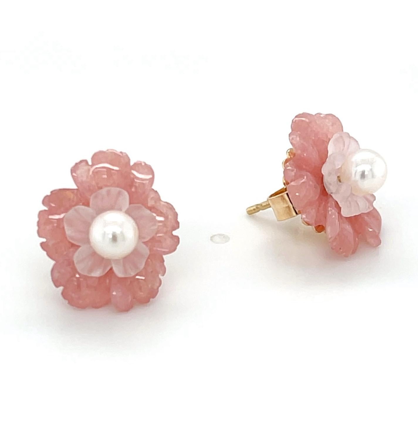 These pretty floral earrings are actually 3 pairs in one! The 4.00 mm pearl stud can be worn alone, or layered with the darker pink carved rhodochrosite flowers, the smaller rose quartz flowers or with both pair at once. They are actually 2 pair of