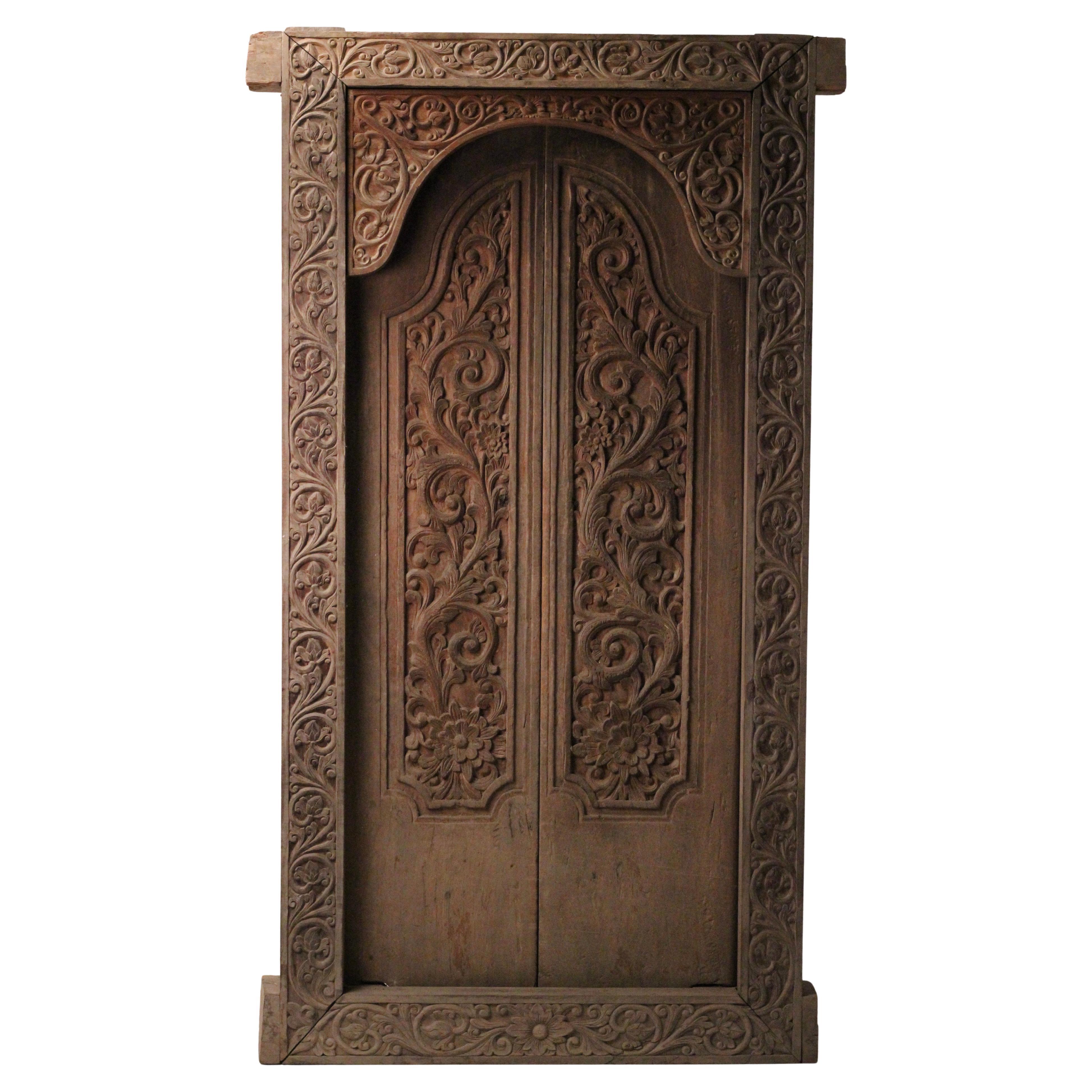 Art Carved Balinese Folk art Balinese teak door, original frame late 19th -early 20th C.