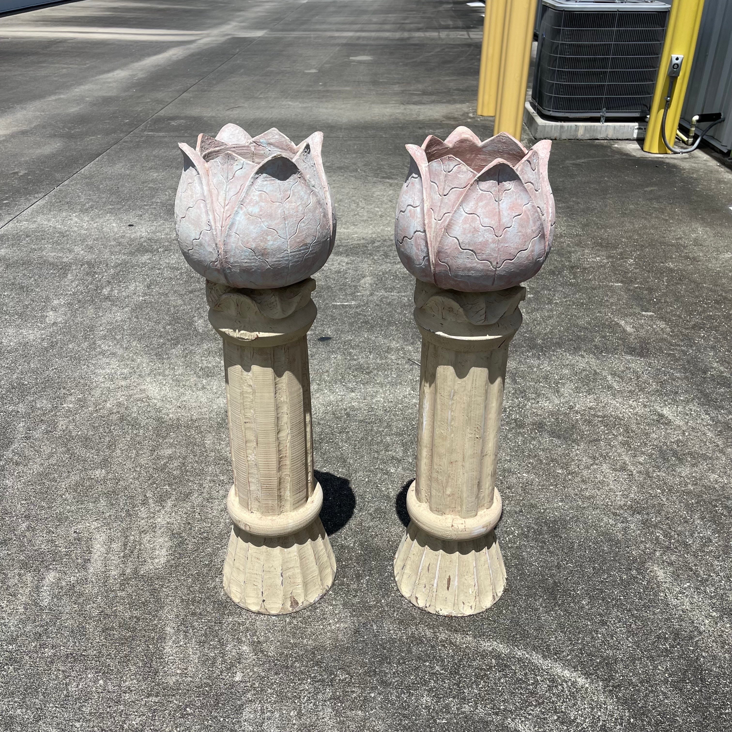 Whimsical stands in the form of a flower bulb atop a pedestal, hand carved from a single log of wood. Can be used as planters/plant stands, decorative pillars, or repurposed into whatever your imagination conjures.