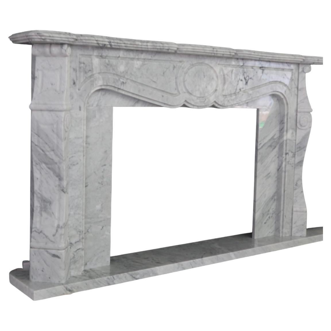This hand-carved French style marble fireplace mantel showcases exquisite craftsmanship and timeless elegance. Made to order, it allows for customization to suit your space, with options like a polished finish for a refined look. The intricate