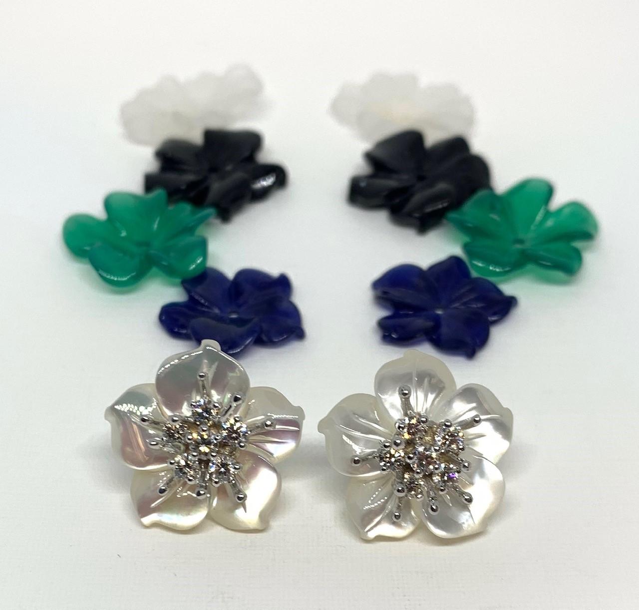 Finely hand-carved flower earring jackets are made of green agate, black onyx, sodalite, mother of pearl, and quartz. They are interchangeable when worn with our handmade 18k white gold 