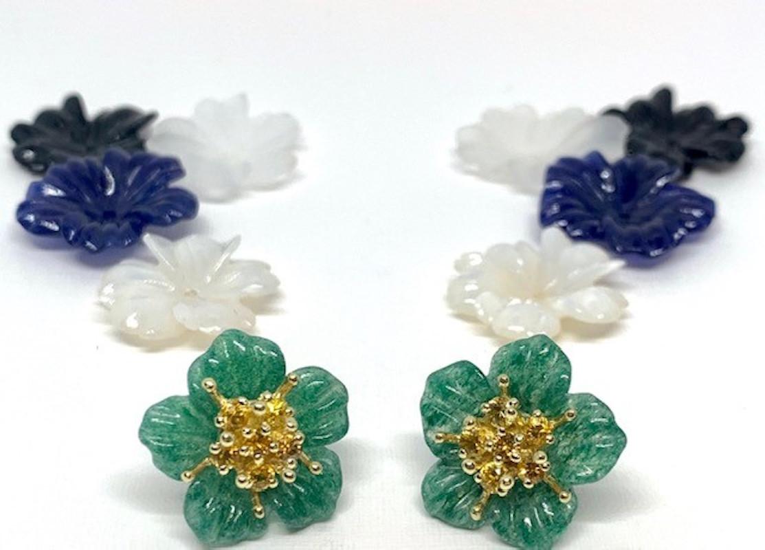 Finely hand-carved flower earring jackets are made of quartz, onyx, sodalite, moss agate and mother of pearl. They are interchangeable when worn with our hand made 18k yellow gold 