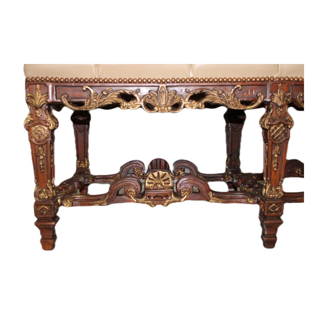 C. mid 20th century

Window benches hand carved & gilded w/ leather seats & brass nail head trim.
