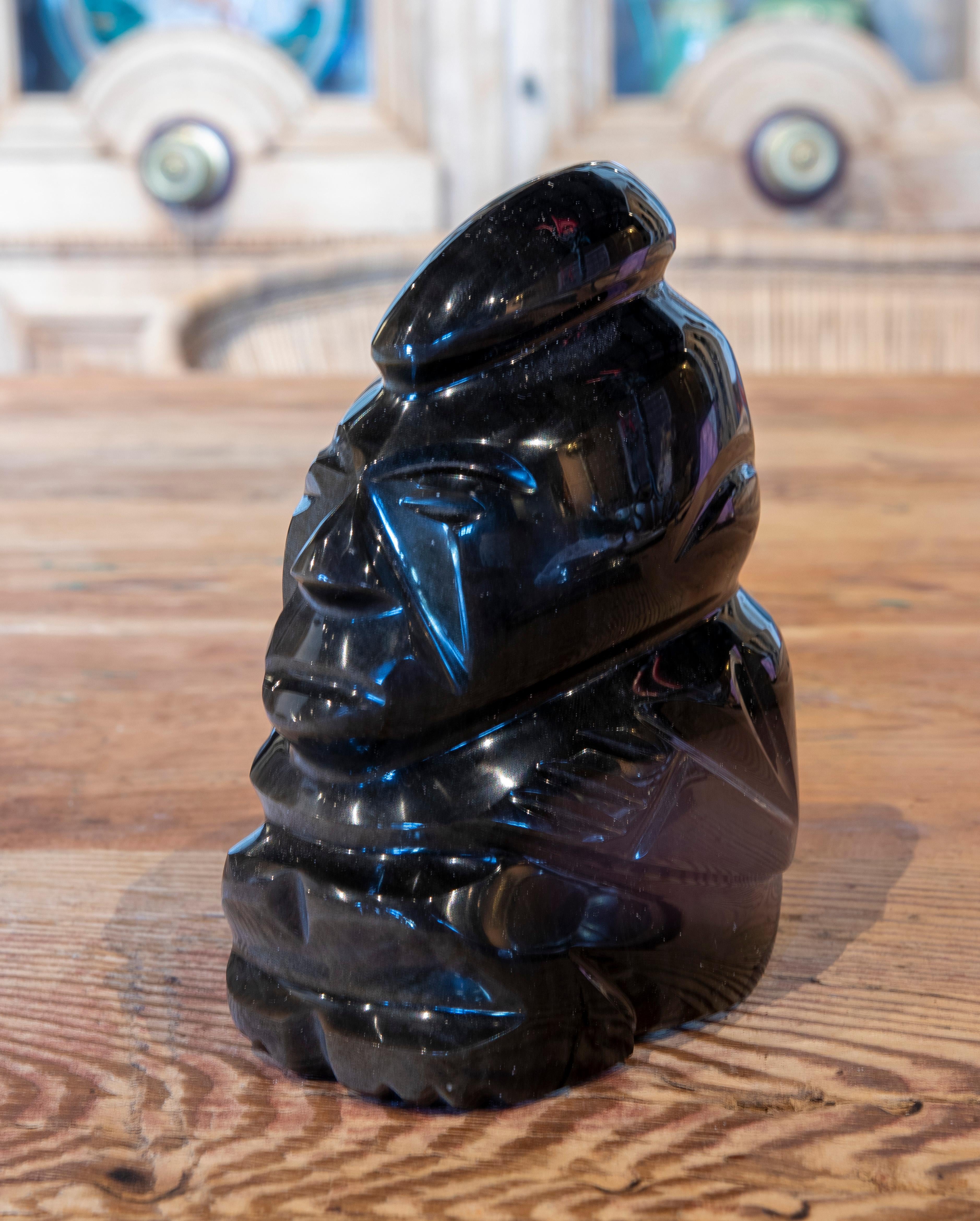 African Hand Carved Glass Figure of a Semi-Seated Personage For Sale