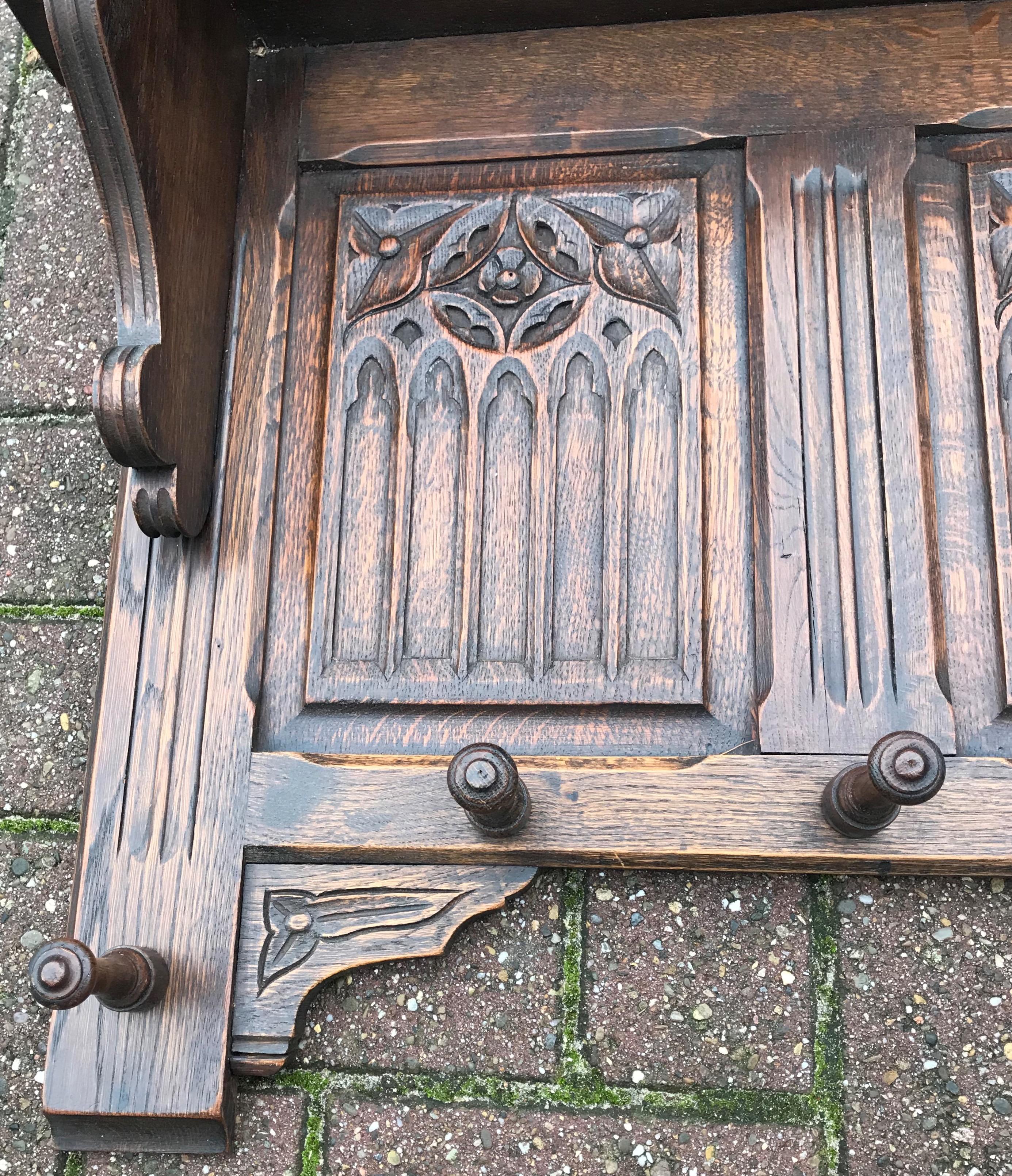 French Hand Carved Gothic Revival Oak Wall Coat Rack with Stylish Church Window Panels