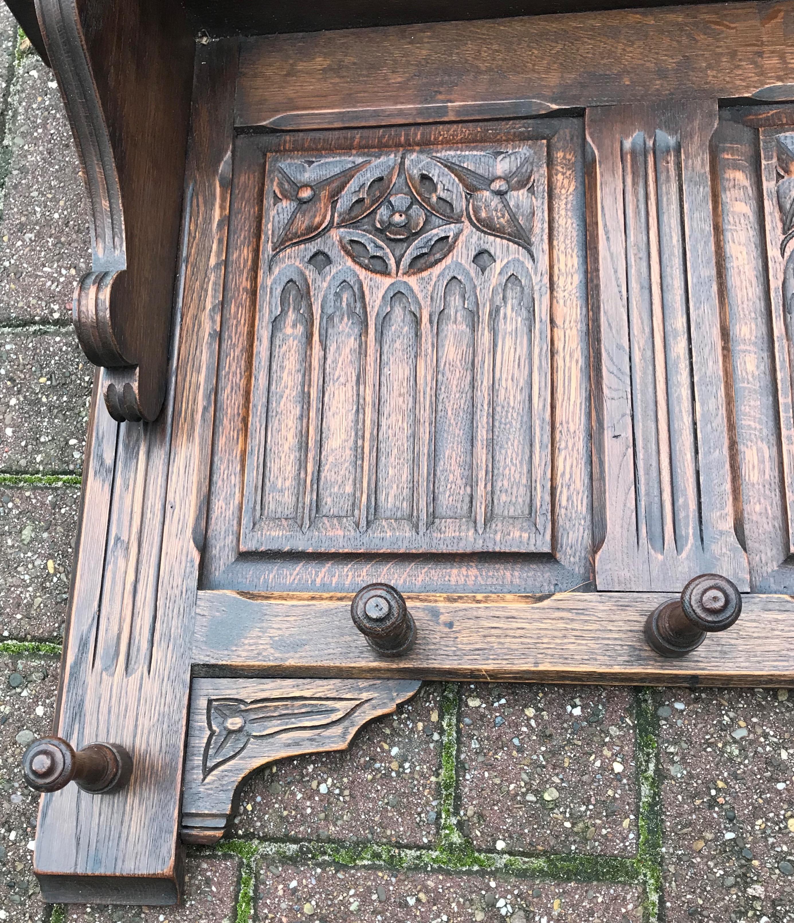 French Hand Carved Gothic Revival Oak Wall Coat Rack with Stylish Church Window Panels 