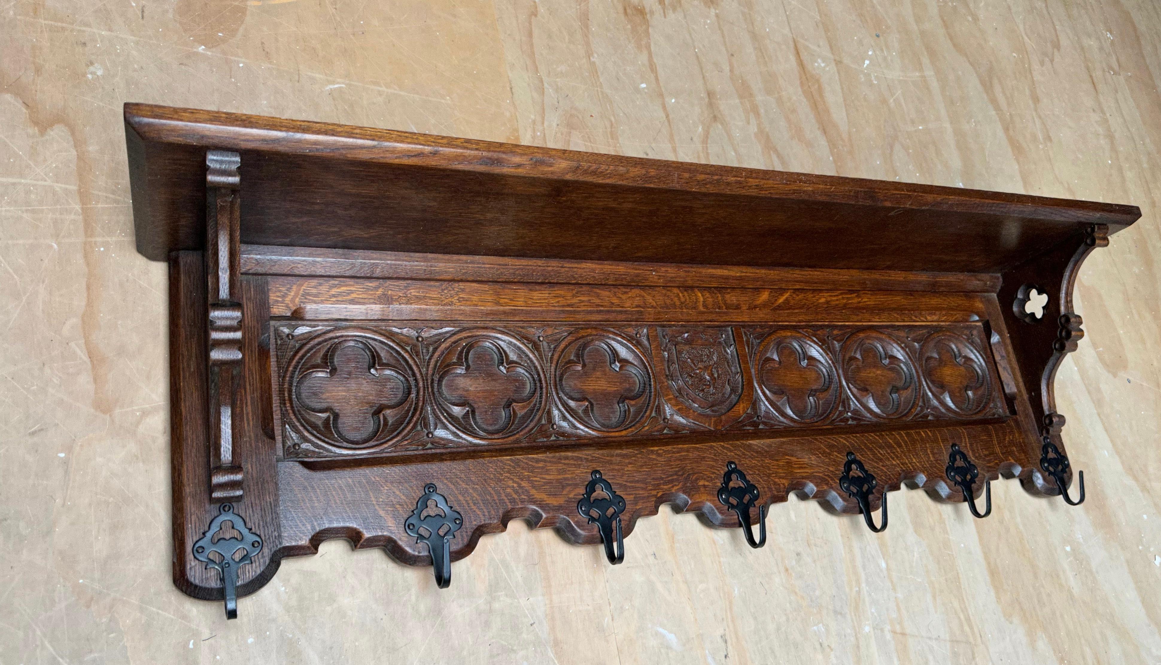 French Hand Carved Gothic Revival Oak Wall Coat Rack with Stylish Church Window Panels For Sale