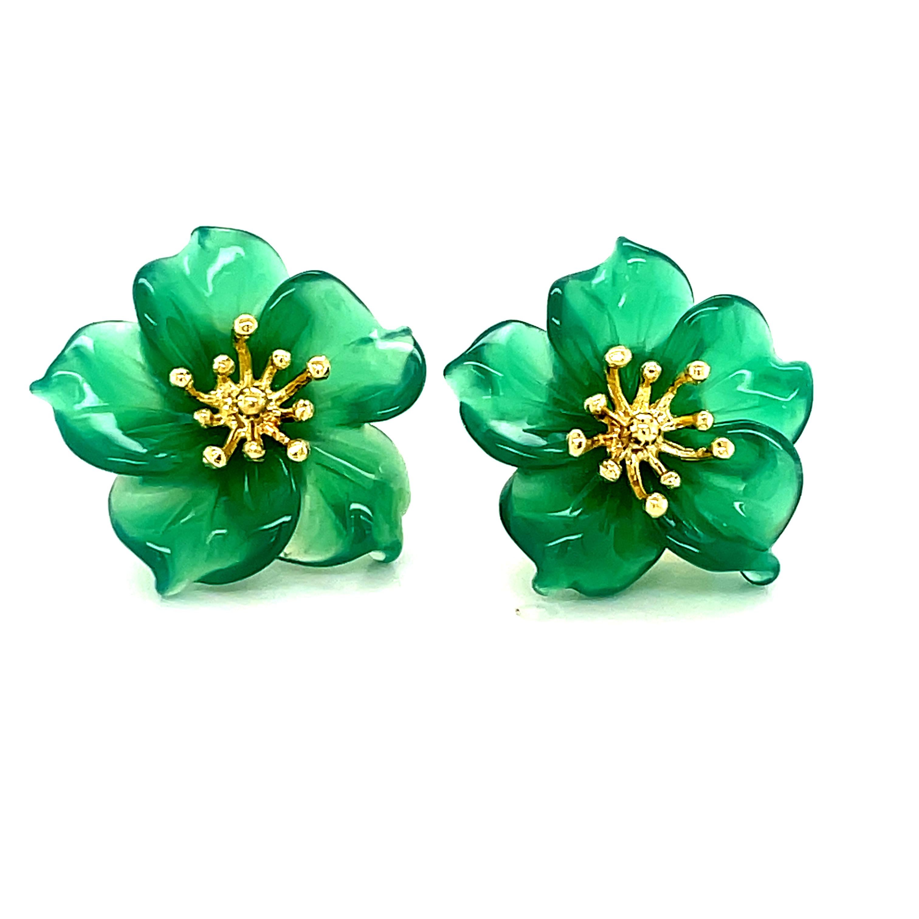 
These finely hand-carved green agate earrings are the perfect color for any season! 3-dimensional flowers were intricately carved from beautifully translucent green agate quartz and look stunning paired with our 18 karat yellow gold post earrings.