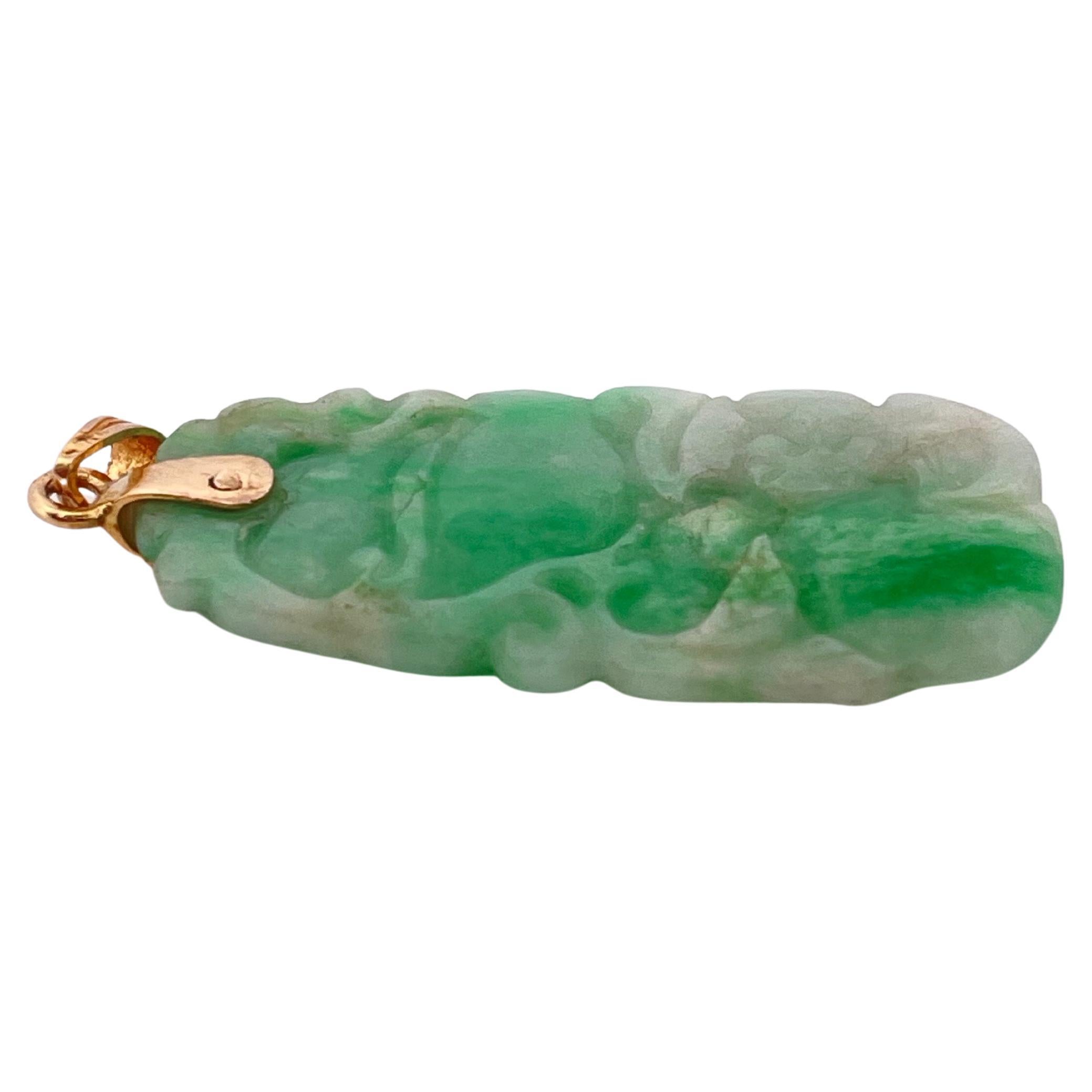 Contemporary Hand carved Green Jade Pendant with 14k Yellow Gold Bail For Sale