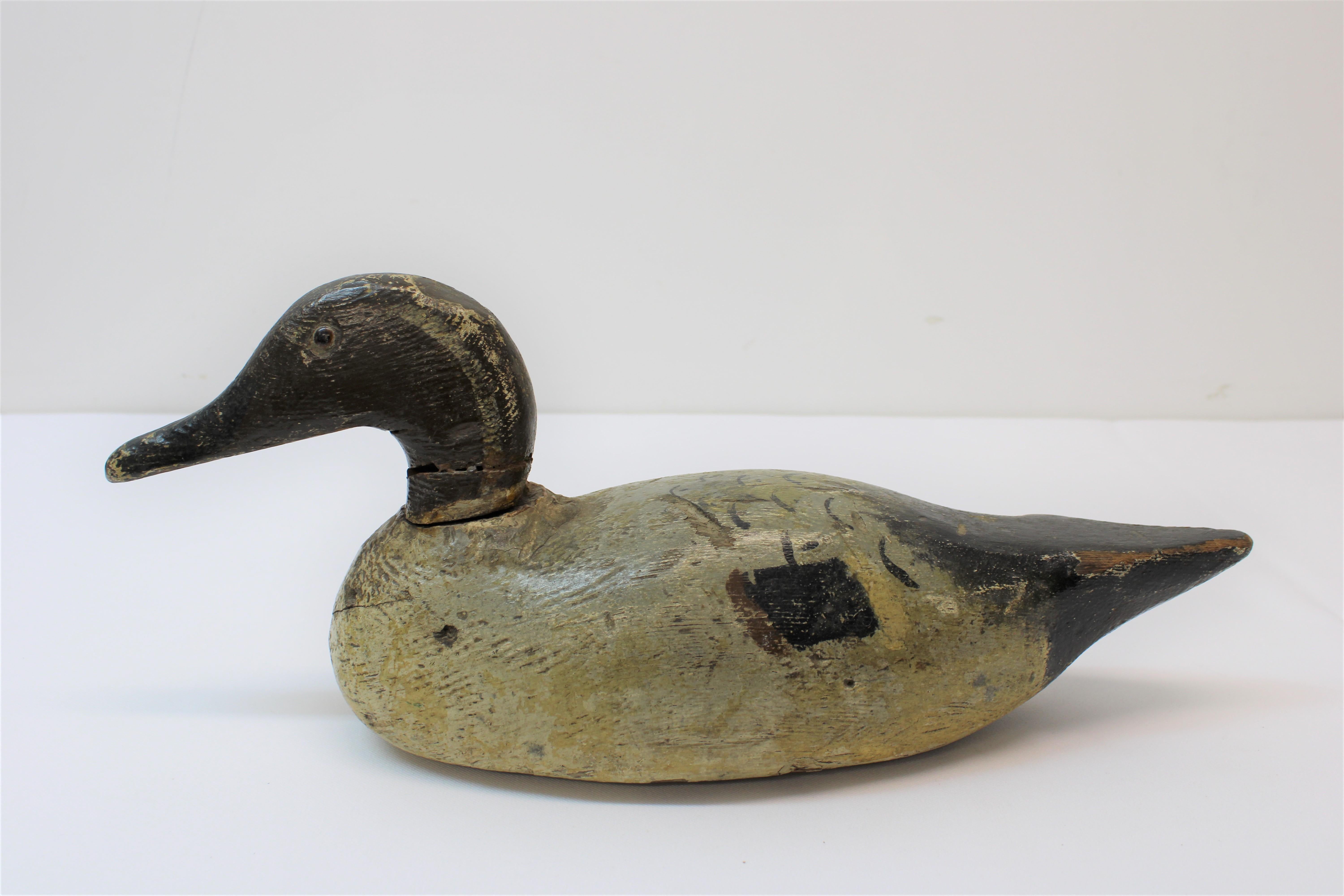 C. Early 20th century hand carved / hand painted decoy's ( ducks )

Measurements for Decoy's Individually

Dark Wood Decoy
Height - 7.00
Width - 5.00
Depth - 17.00

Medium Wood Decoy
Height - 6.00
Width - 5.50
Depth - 14.50.