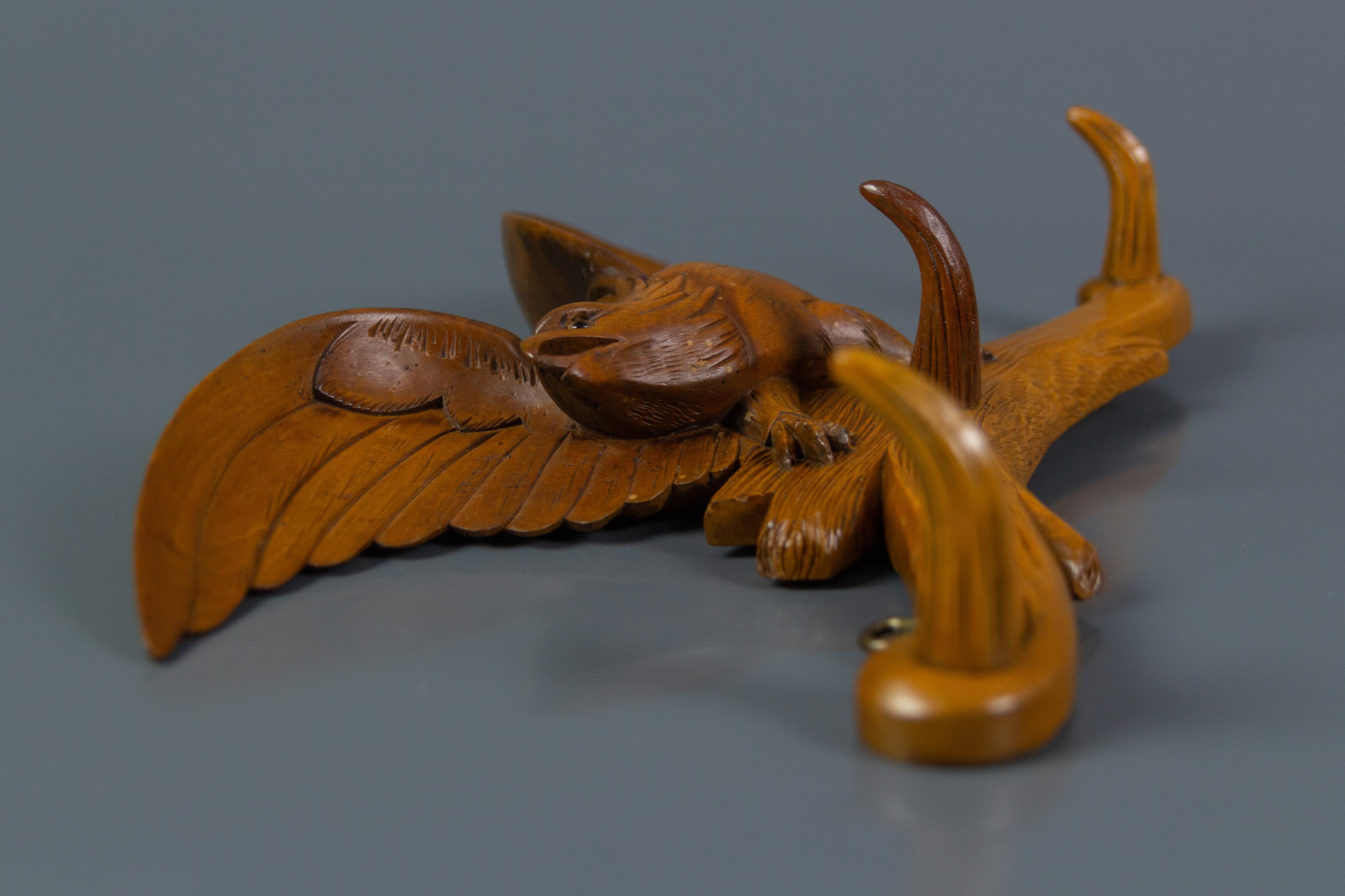 Black Forest Hand Carved Hat Rack with Eagle Carving and Three Wooden Hooks, Germany, 1930s
