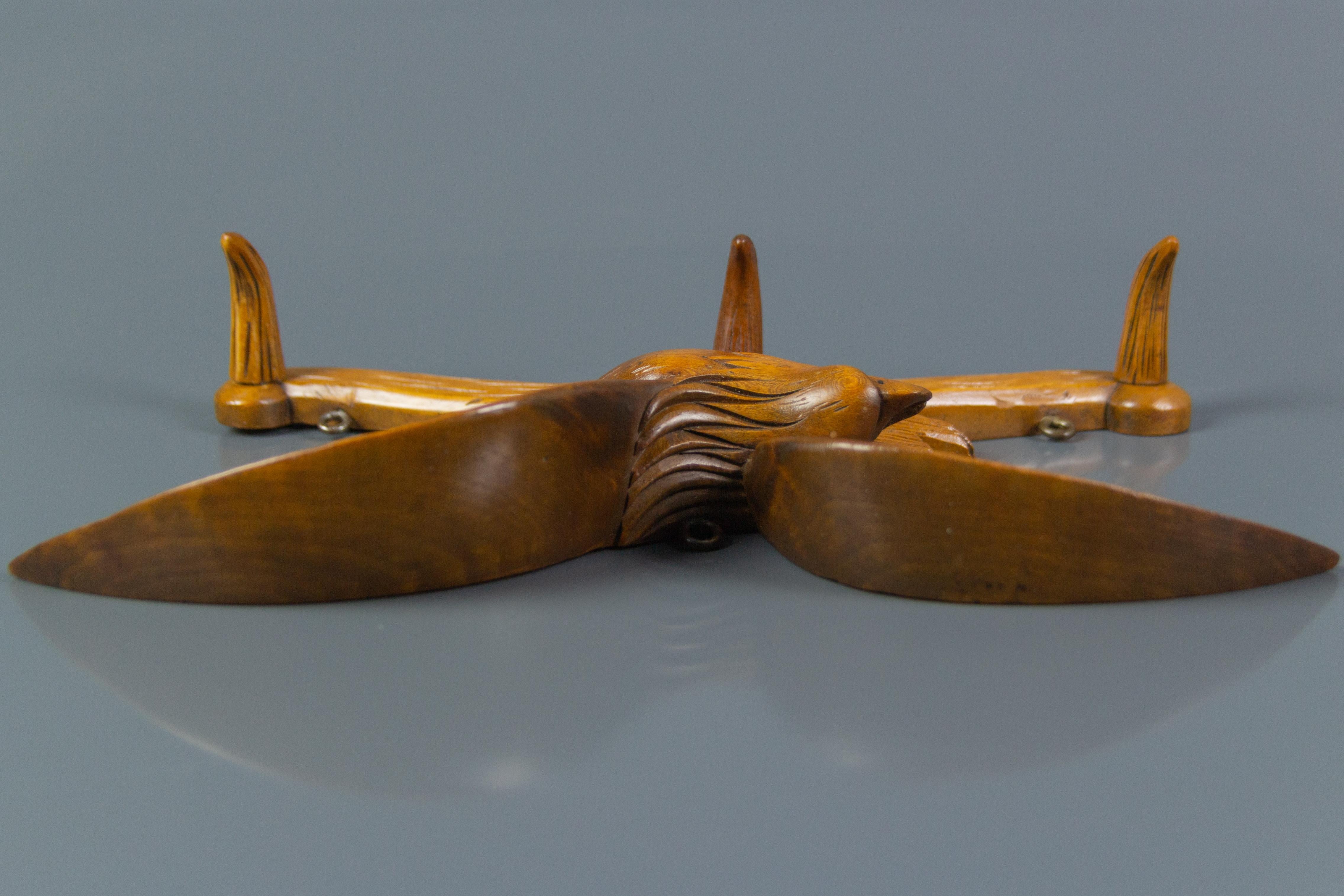 Hand-Carved Hand Carved Hat Rack with Eagle Carving and Three Wooden Hooks, Germany, 1930s