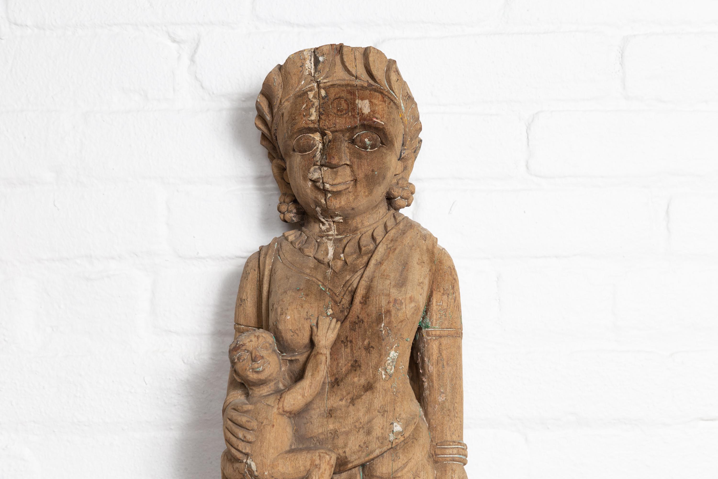 wood carved indian statue