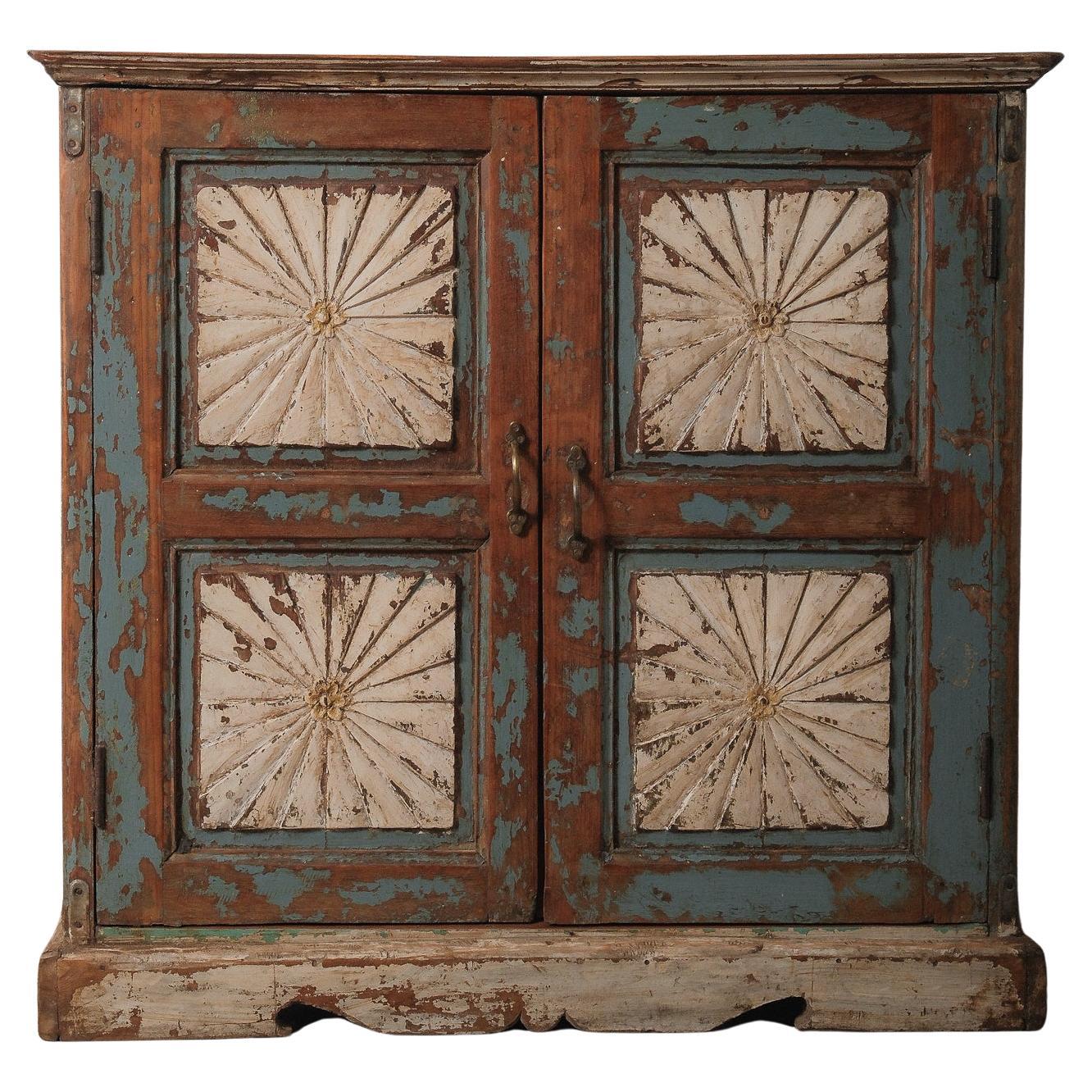 Hand-Carved Indian Wooden Cabinet with Sunburst Panels and Original Blue Paint For Sale