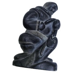 Hand Carved Inuit Folk Art Soapstone Figure of  a Man with a Fish C1975