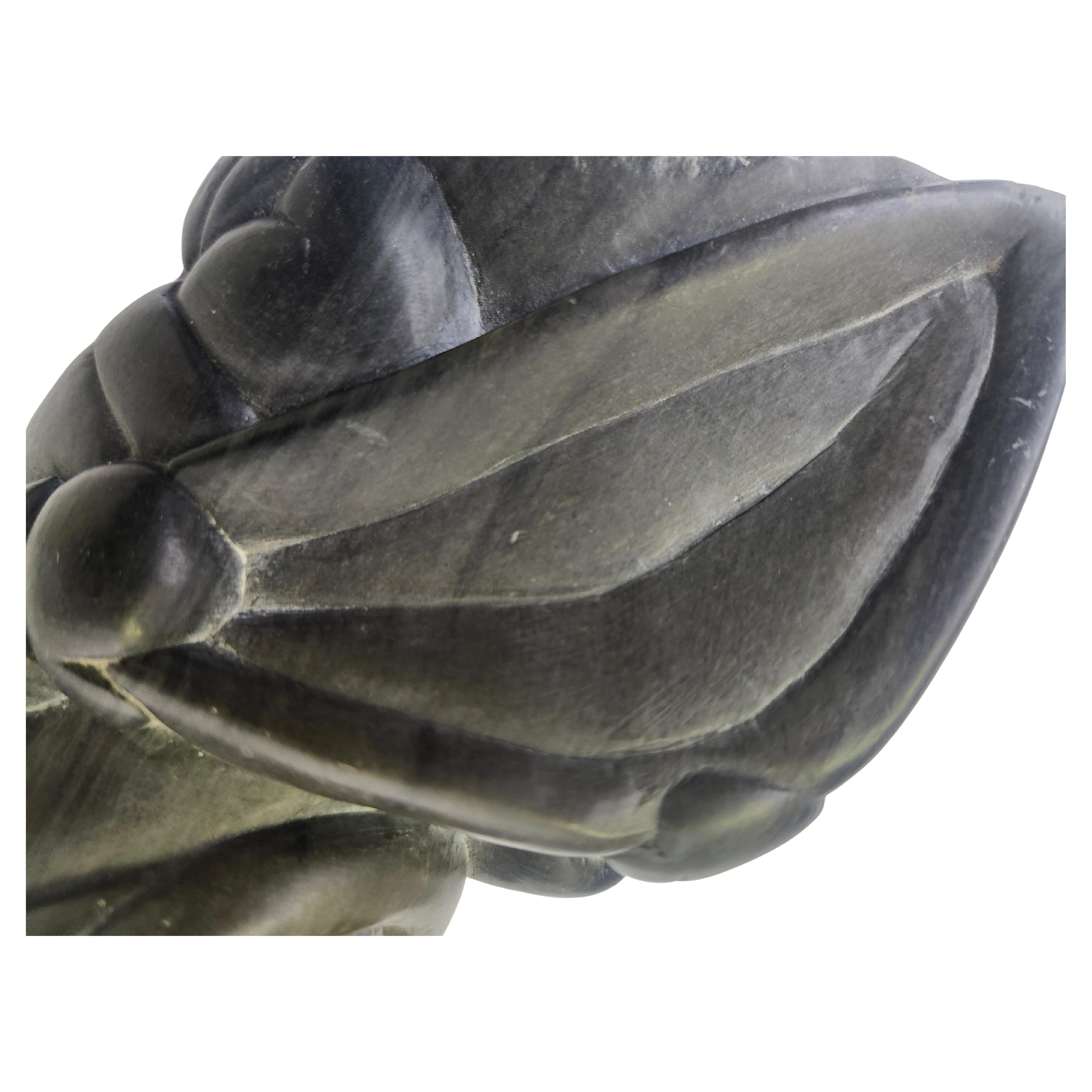Hand-Carved Hand Carved Inuit Folk Art Soapstone Figure of  a Man with a Fish C1975 For Sale
