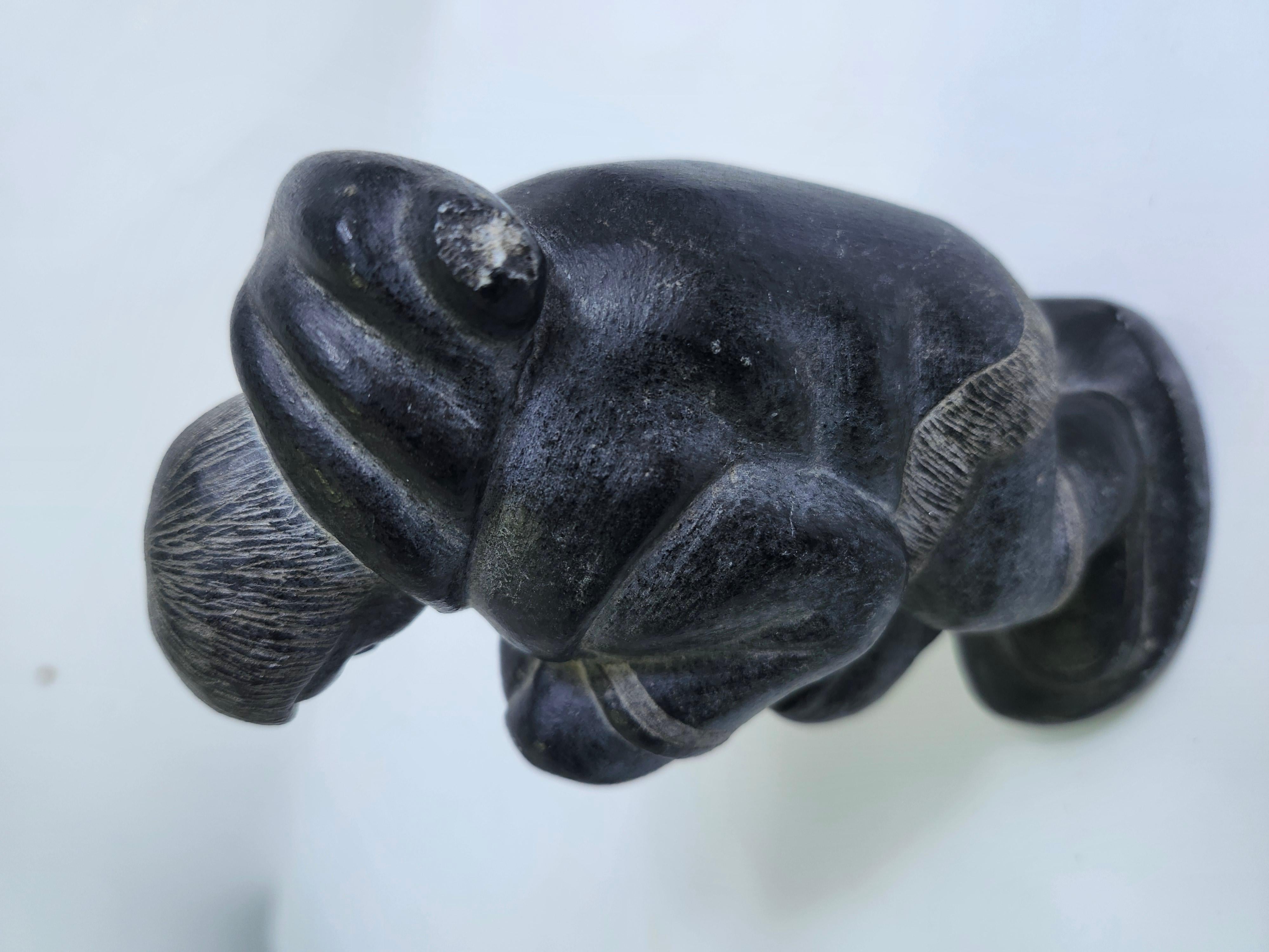 Hand Carved Inuit Folk Art Soapstone Figure of  a Man with a Fish C1975 For Sale 1