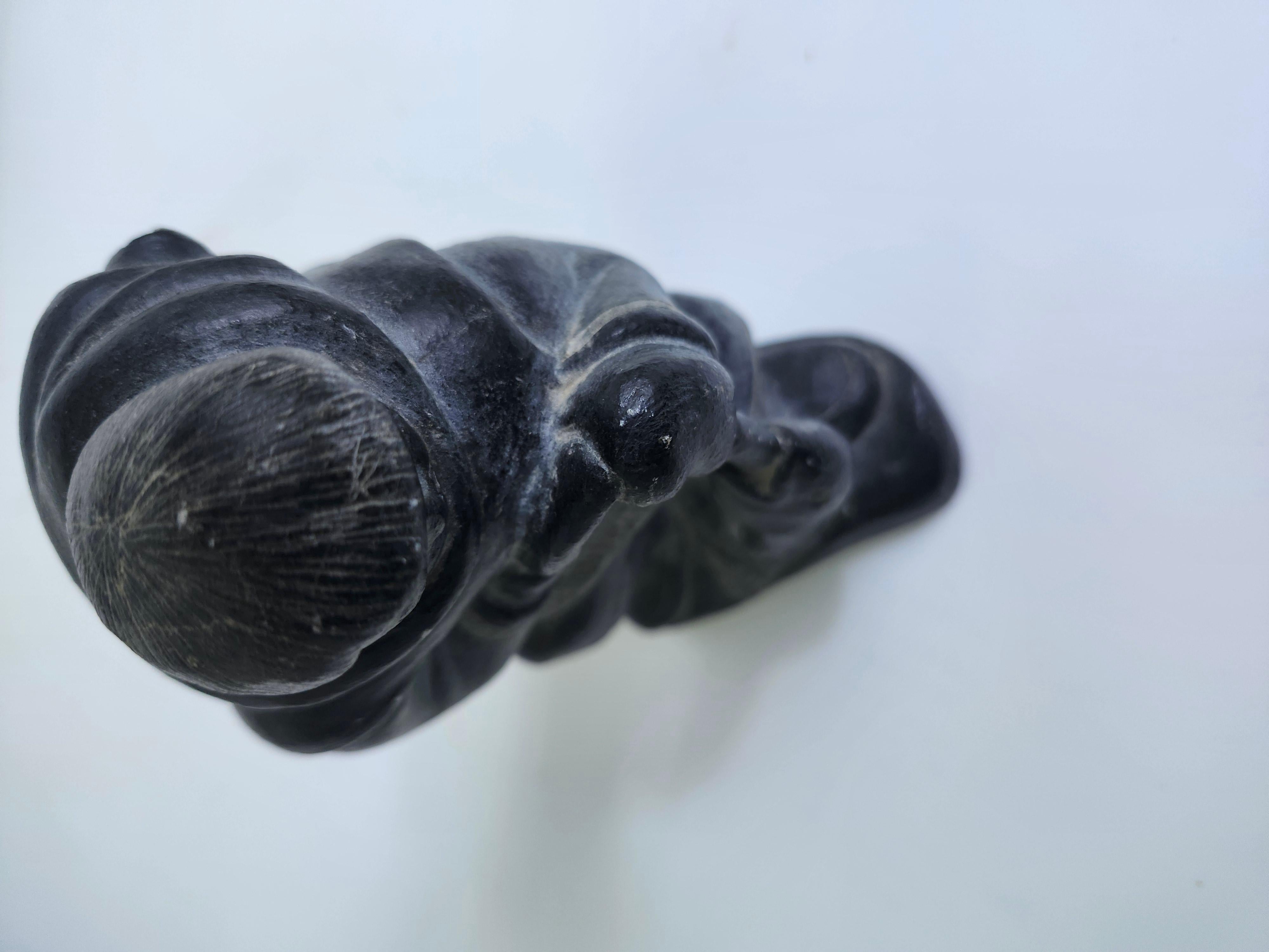 Hand Carved Inuit Folk Art Soapstone Figure of  a Man with a Fish C1975 For Sale 3