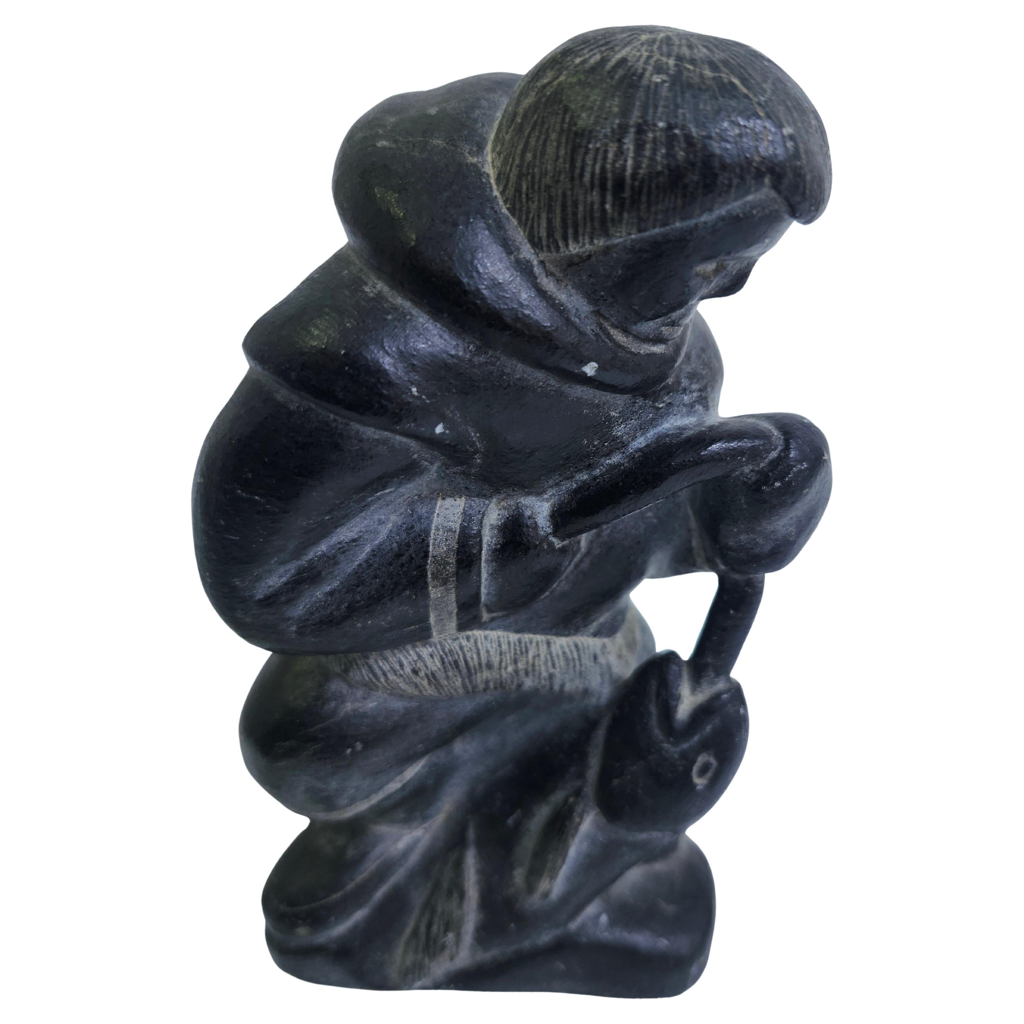 Hand Carved Inuit Folk Art Soapstone Figure of  a Man with a Fish C1975