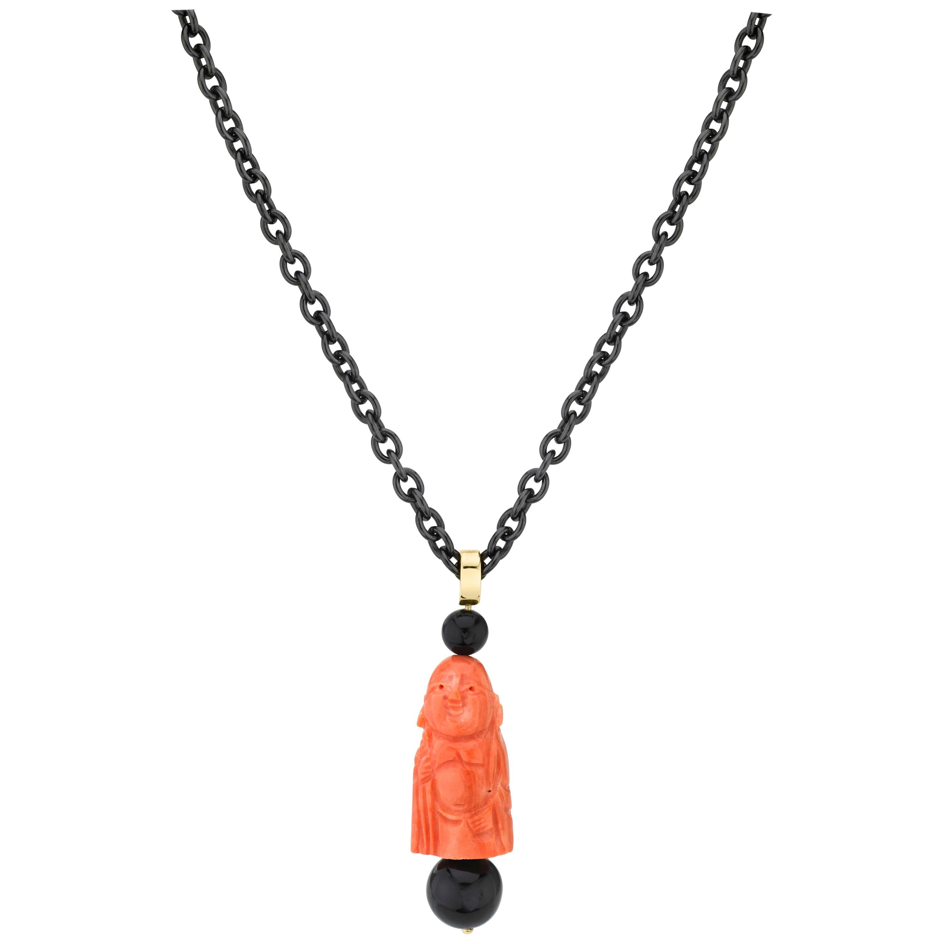Hand Carved Italian Coral and Onyx Pendant in Gold with Blackened Steel Chain For Sale