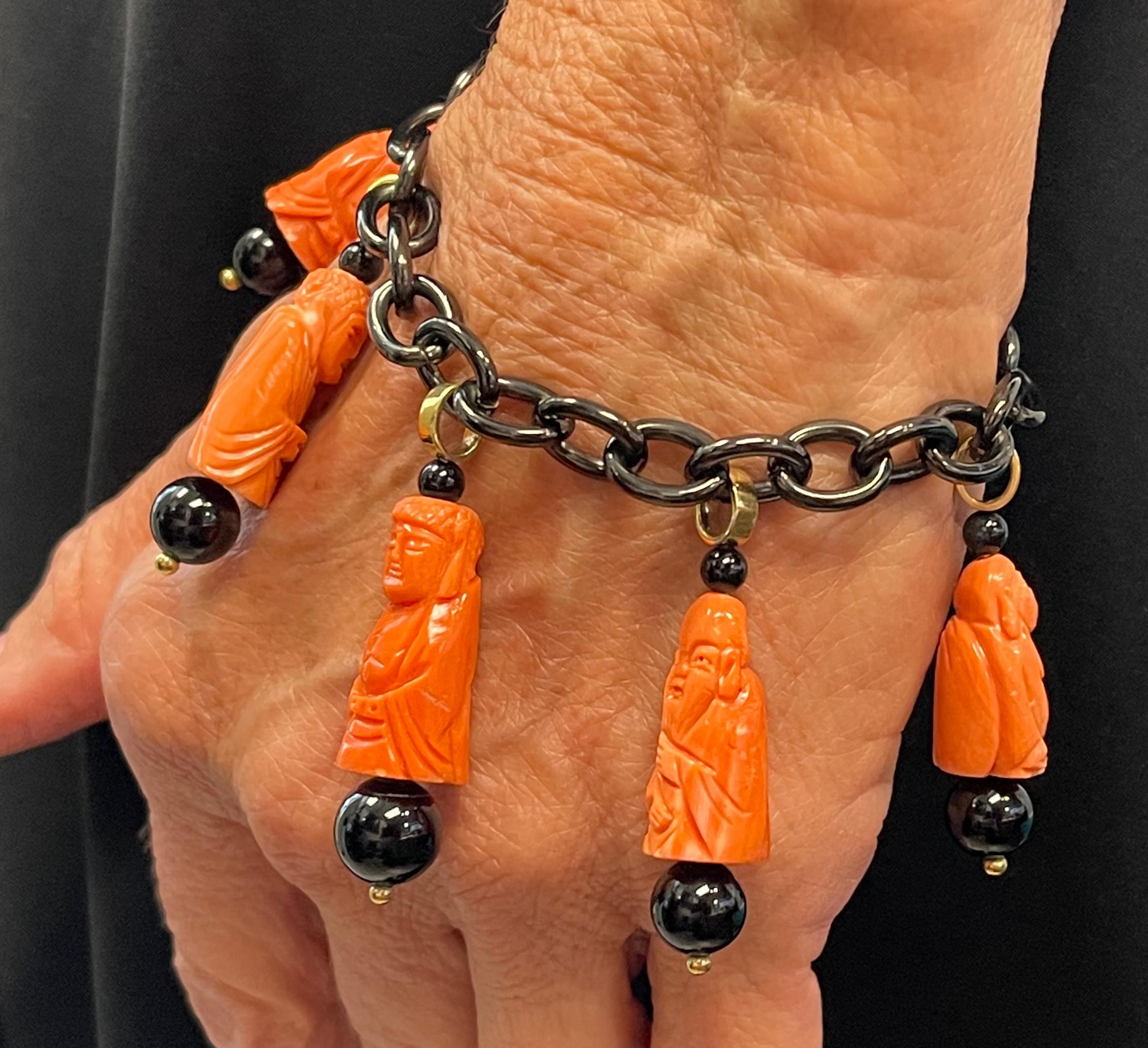 Hand Carved Italian Coral and Onyx Charm Bracelet, in Gold with Blackened Steel For Sale 1