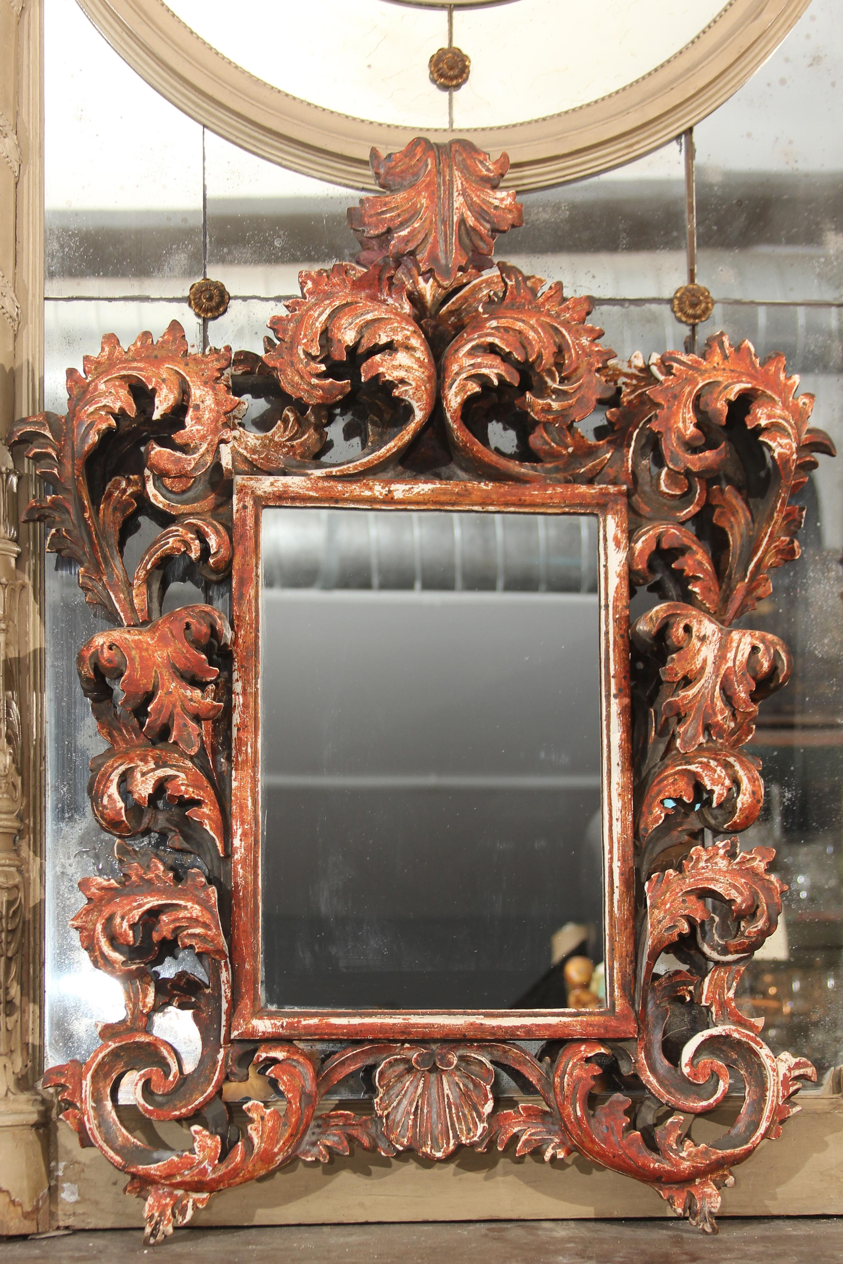 Highly carved wood frame mirror, nice size and great color. Italian. Original mirror has been replaced.