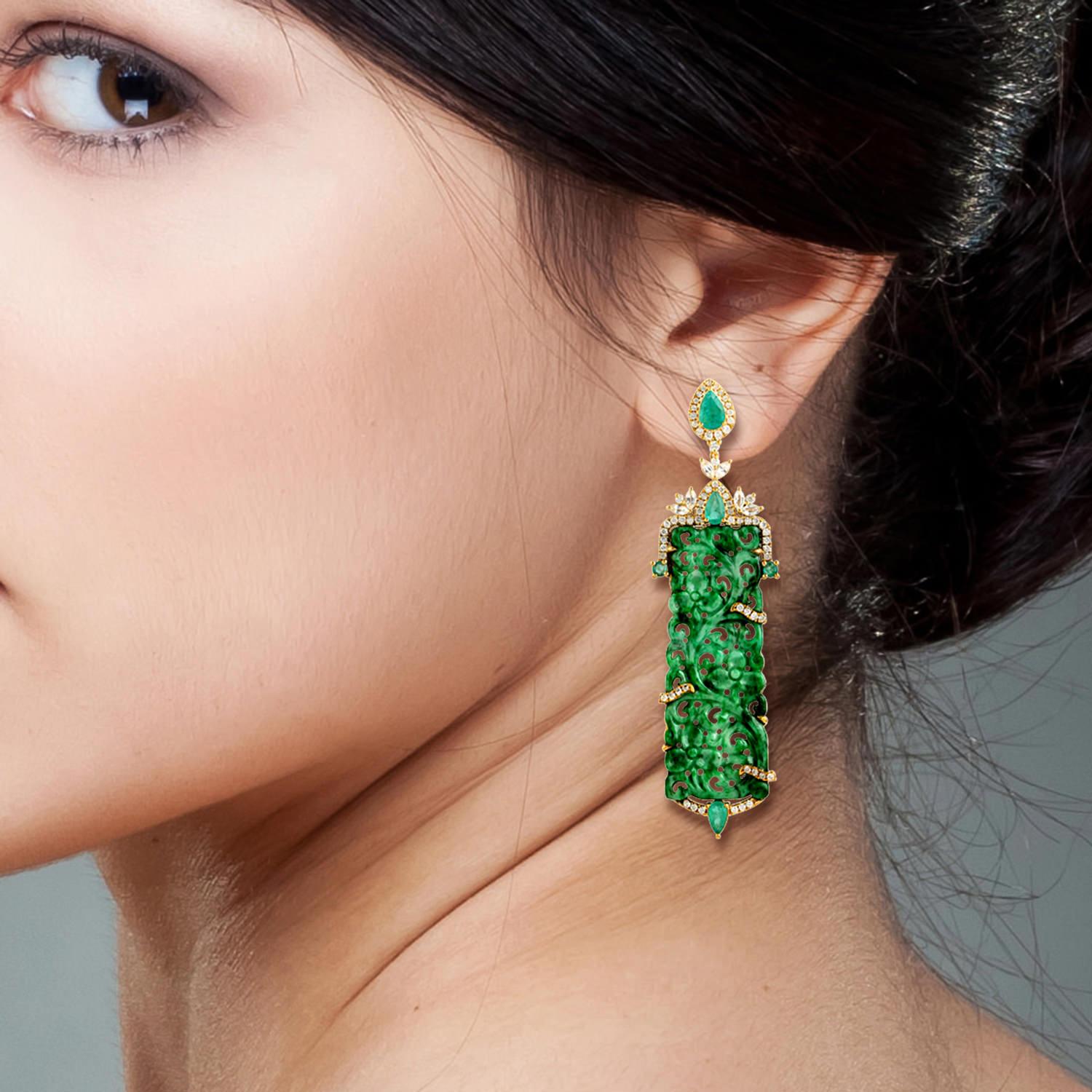 These stunning hand carved Jade earrings are thoughtfully and meticulously crafted in 18-karat gold. It is set in 25.24 carats Jade, 1.9 carats emerald and .90 carats of diamonds.

FOLLOW  MEGHNA JEWELS storefront to view the latest collection &