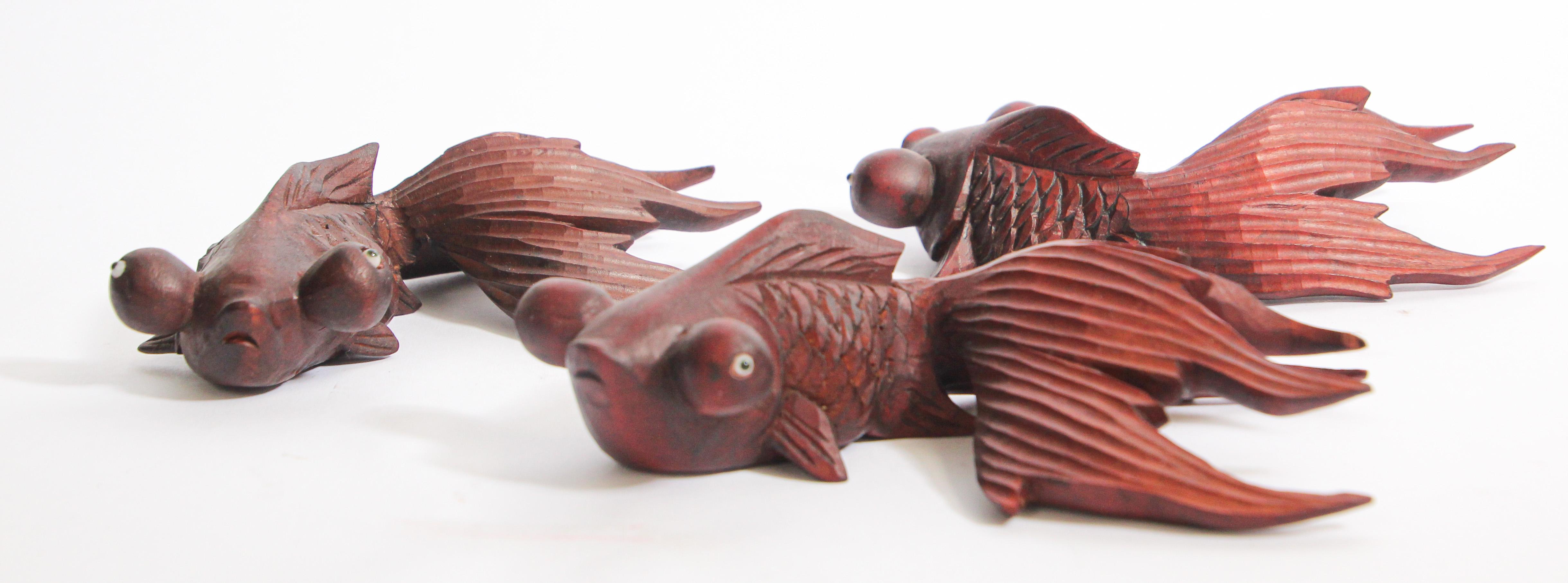 Antique hand carved set of three carved wooden rosewood Asian Koi fish 