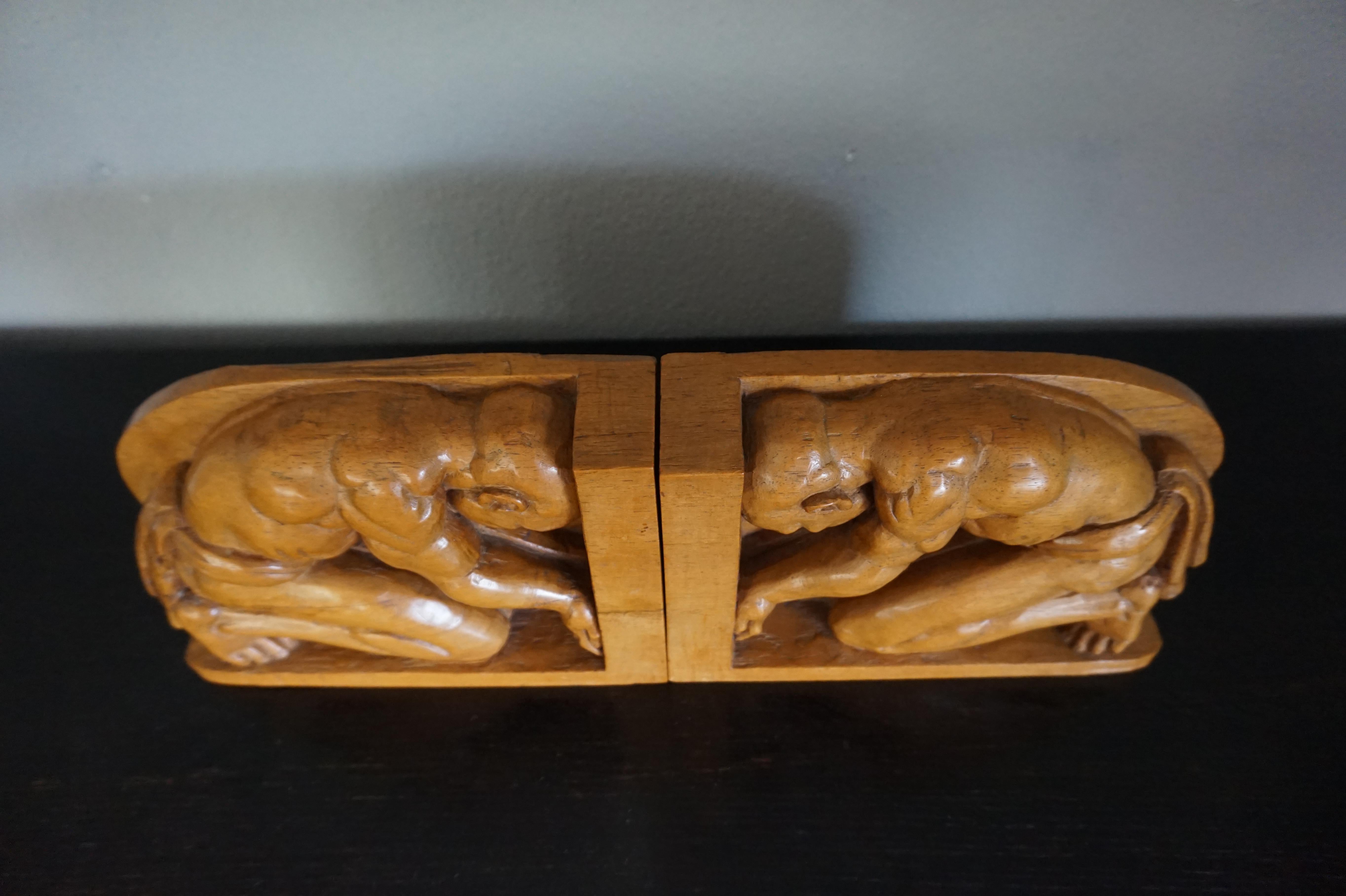 Dutch Hand-Carved Jati Wood Arts & Crafts Bookends with Indigenous Male Sculptures For Sale