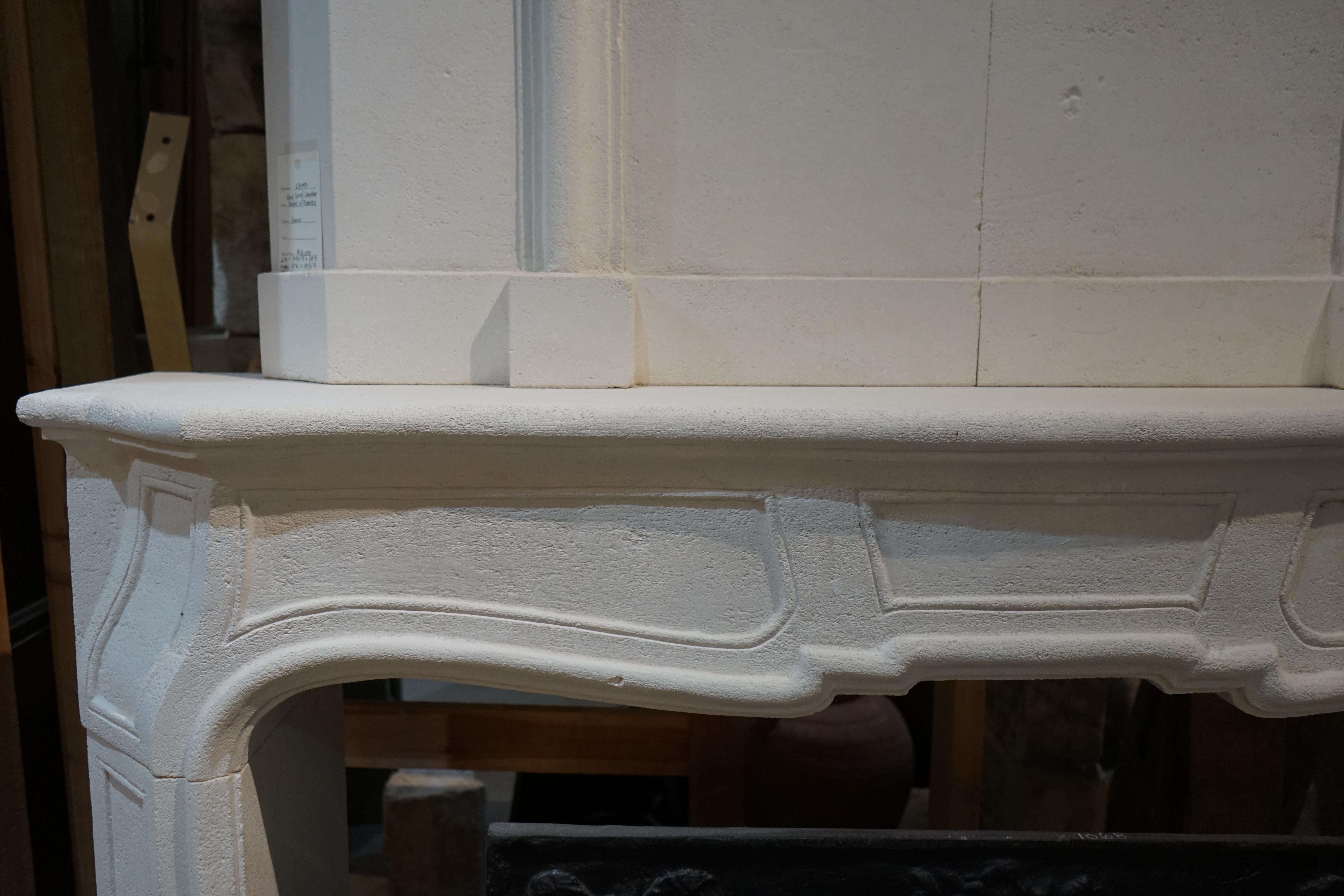 Hand Carved Limestone Mantel with Trumeau In Good Condition In Dallas, TX