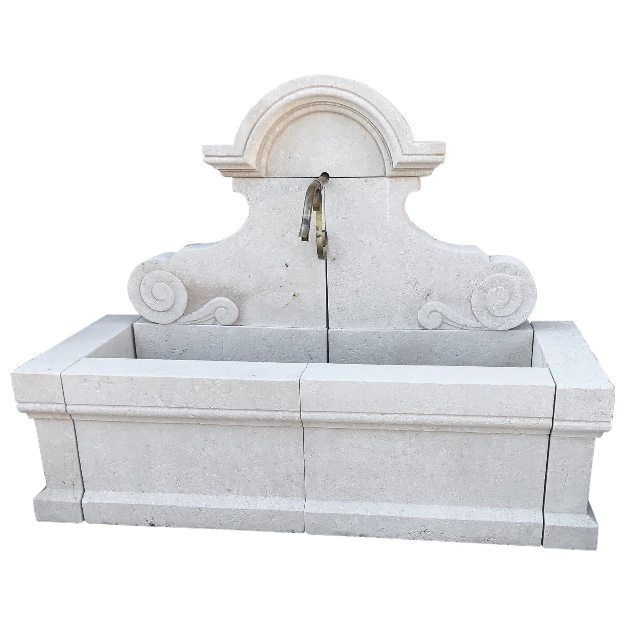 Hand-Carved Limestone Wall Fountain For Sale