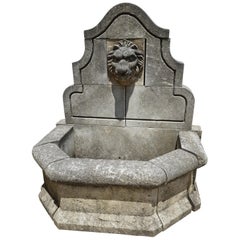 Hand Carved Limestone Wall Fountain with Lion Medallion