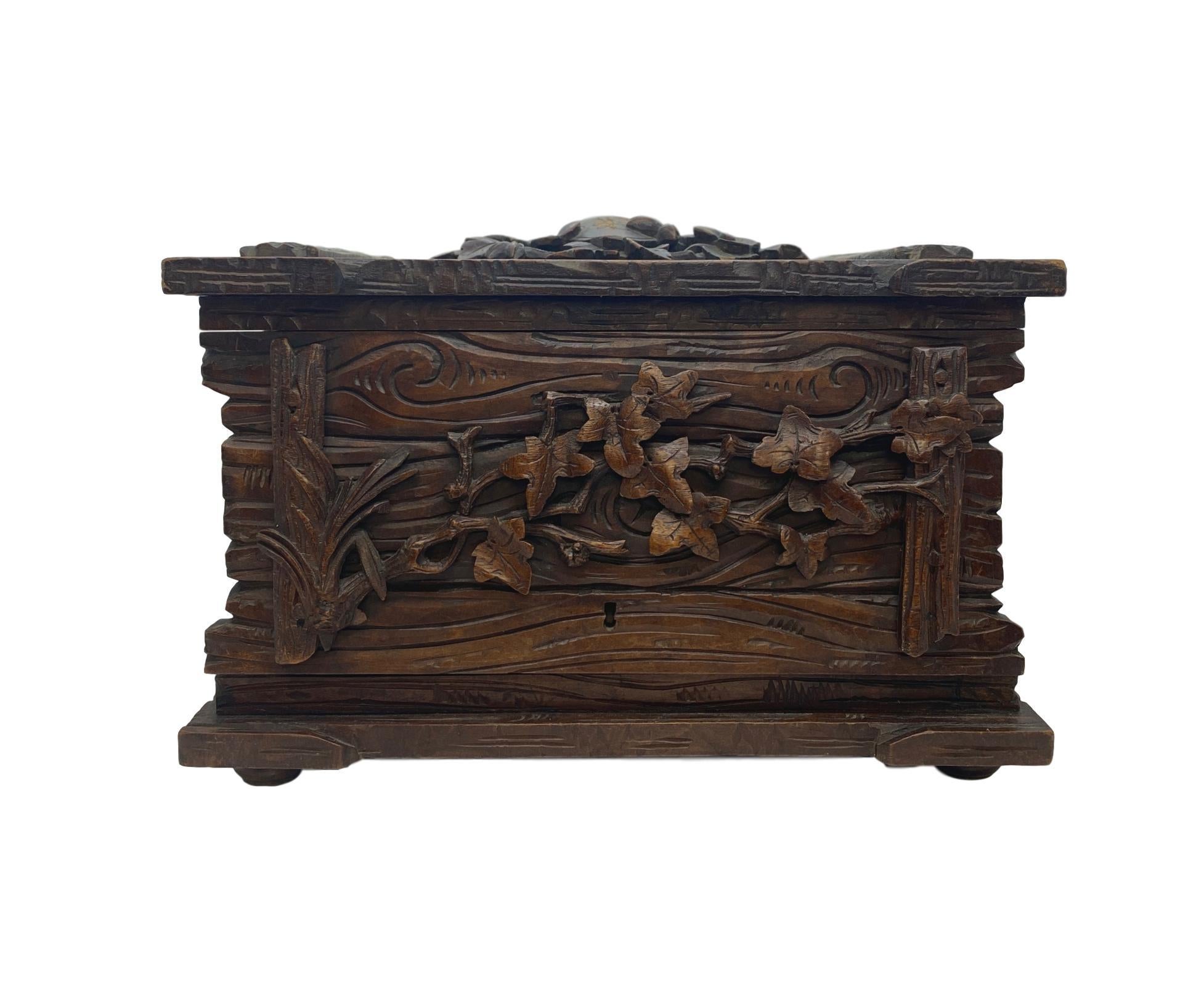 Hand carved linden wood Black Forest cigar box humidor, Brienz, Switzerland, circa 1880

Jay Arenski, et al, in his book quotes Swiss Poet Heinrich Federer, who said in his memoirs, 