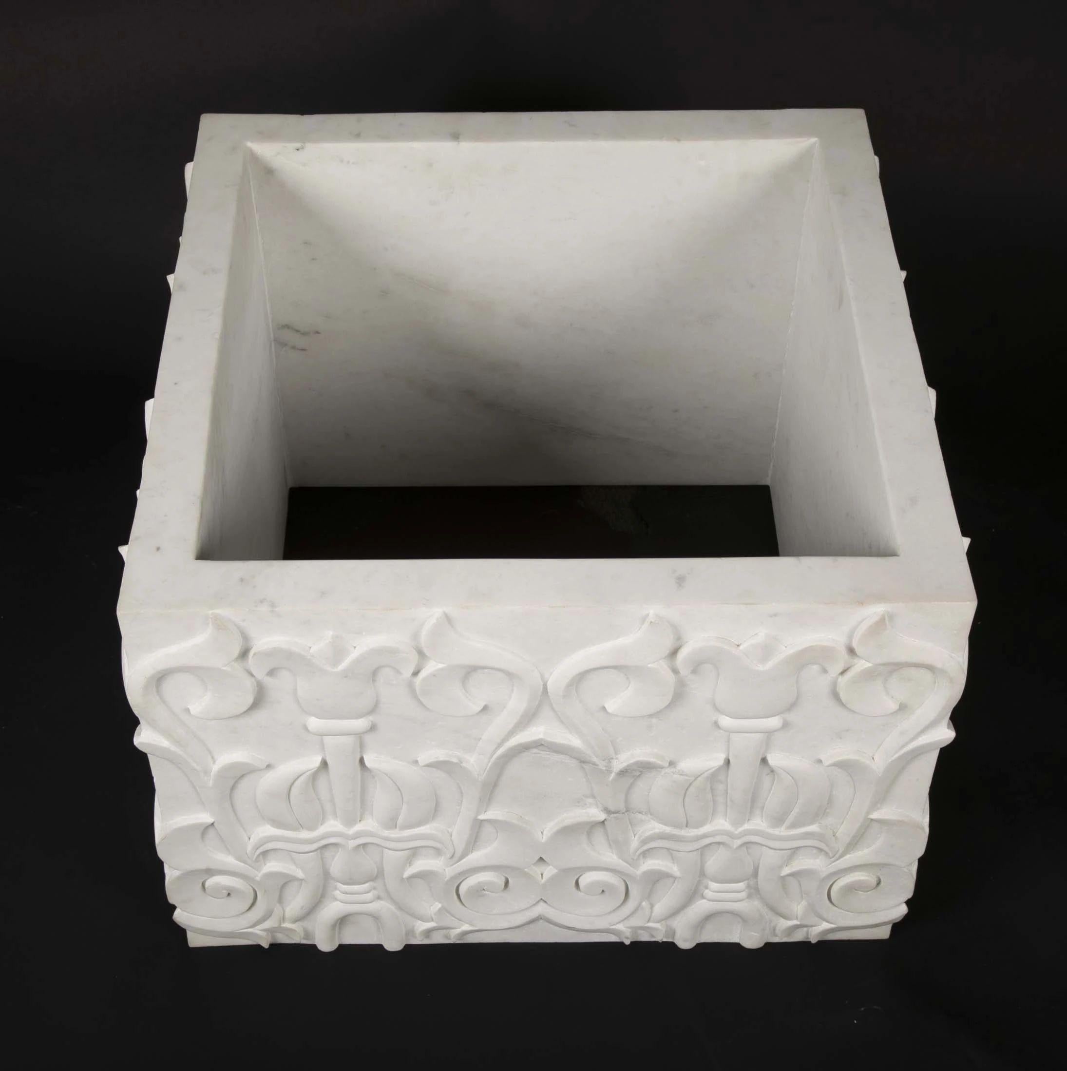 A hand-carved, white marble, square end table base inspired by the tibetan lotus motif. Works perfectly with a glass top.


Hand Carved Lotus Marble Table Base
Size- 23.5