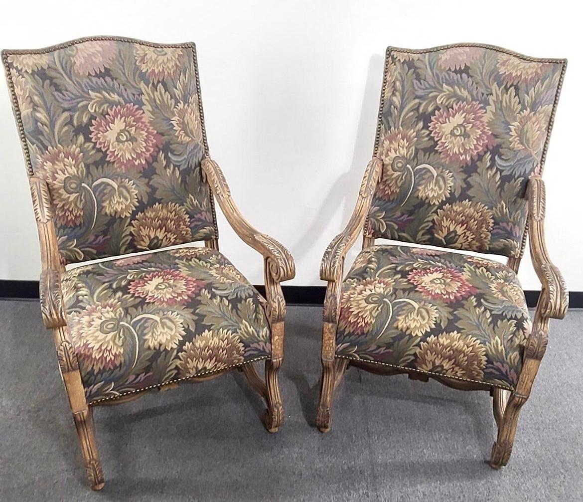 Vintage needlepoint chairs. These intricately carved wood chairs as beautiful as they are sturdy. The floral needlepoint is in very good condition. These may be 1930’s -40’s reproductions.