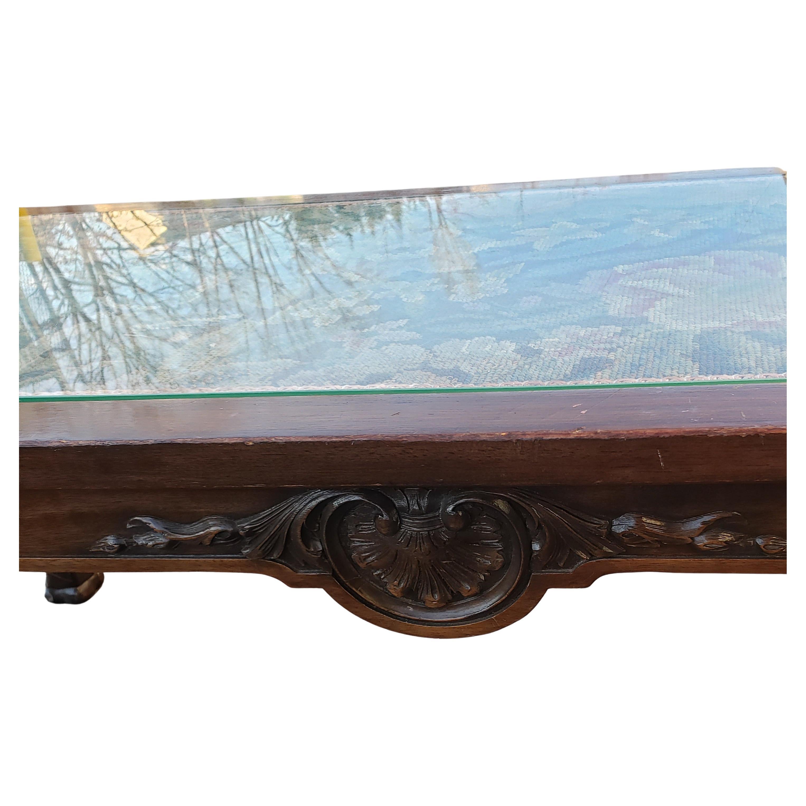 American Hand Carved Mahogany Coffee Table W Glass Top Insert over Handmade Fabric For Sale