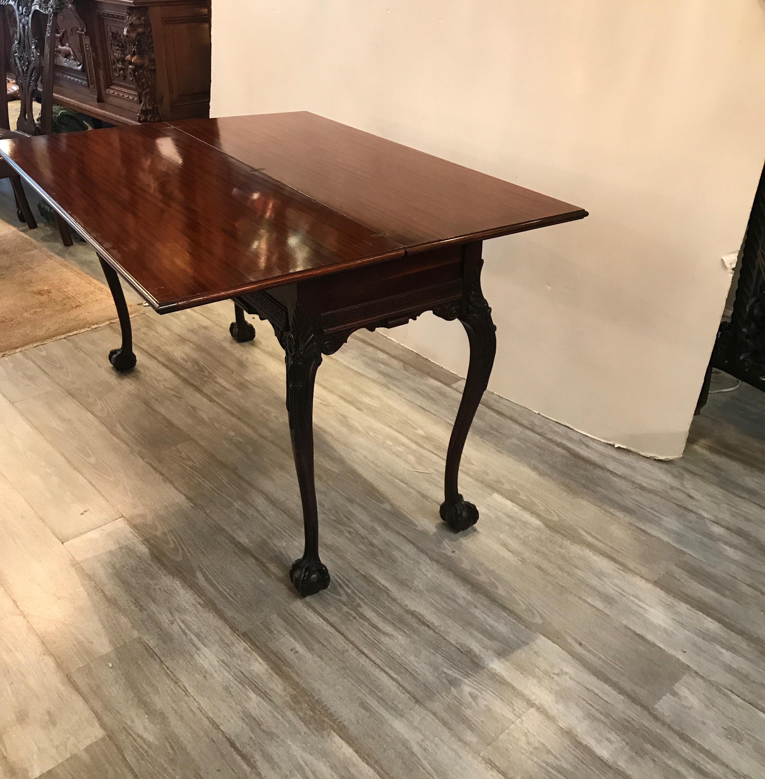 Early 20th Century Hand Carved Mahogany Console Table Opens to a Dining Table