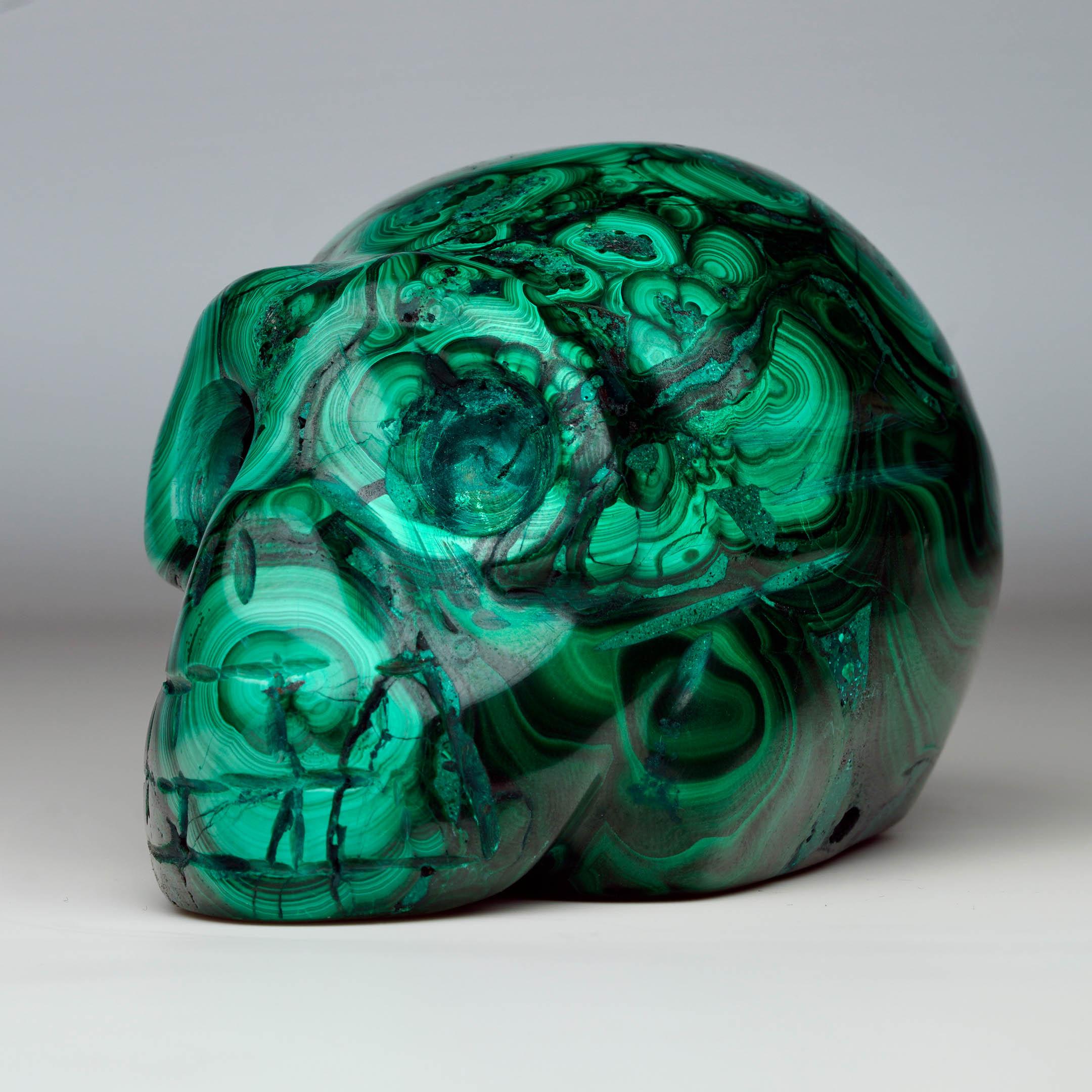 Calavera de malaquita tallada a mano Congoleño en venta
