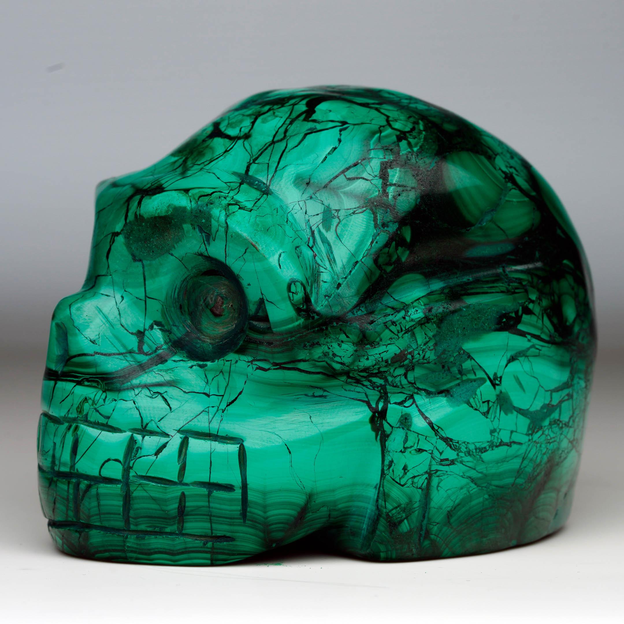 Calavera de malaquita tallada a mano Congoleño en venta